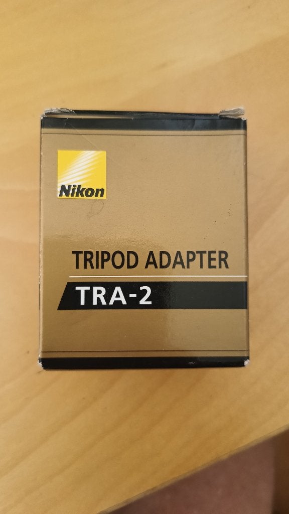 Nikon Tripod verrekijker adapter TRA-2, Audio, Tv en Foto, Optische apparatuur | Verrekijkers, Ophalen of Verzenden, Nieuw, Minder dan 8x