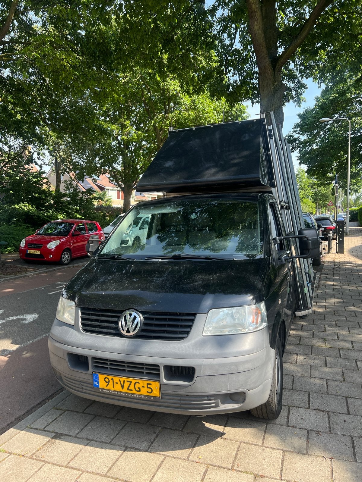 Volkswagen Transporter Glasresteel CC 1.2 2009, Auto's, Bestelauto's, Volkswagen, Zwart, Origineel Nederlands, Euro 4