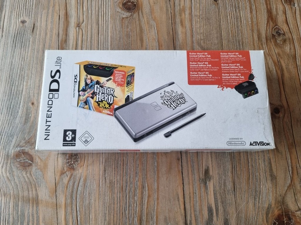 Nintendo DS Guitar Hero - CIB, Spelcomputers en Games, Spelcomputers | Nintendo DS, Ophalen of Verzenden, Zo goed als nieuw, Zilver