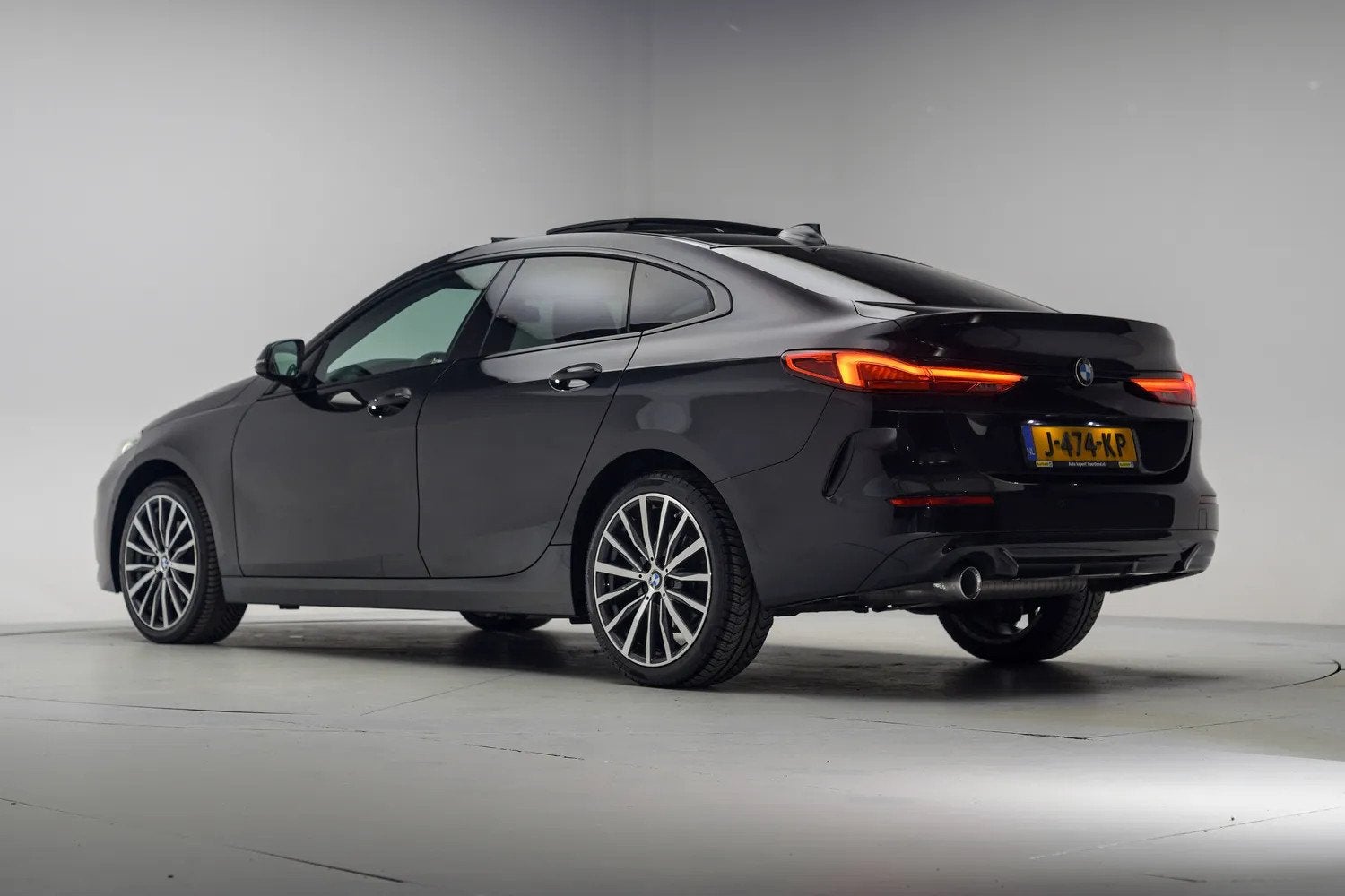 BMW 2 Serie Gran Coupe 218i High Executive Sport Aut. [ Pano, Auto's, Automaat, Gebruikt, 1350 kg, Zwart