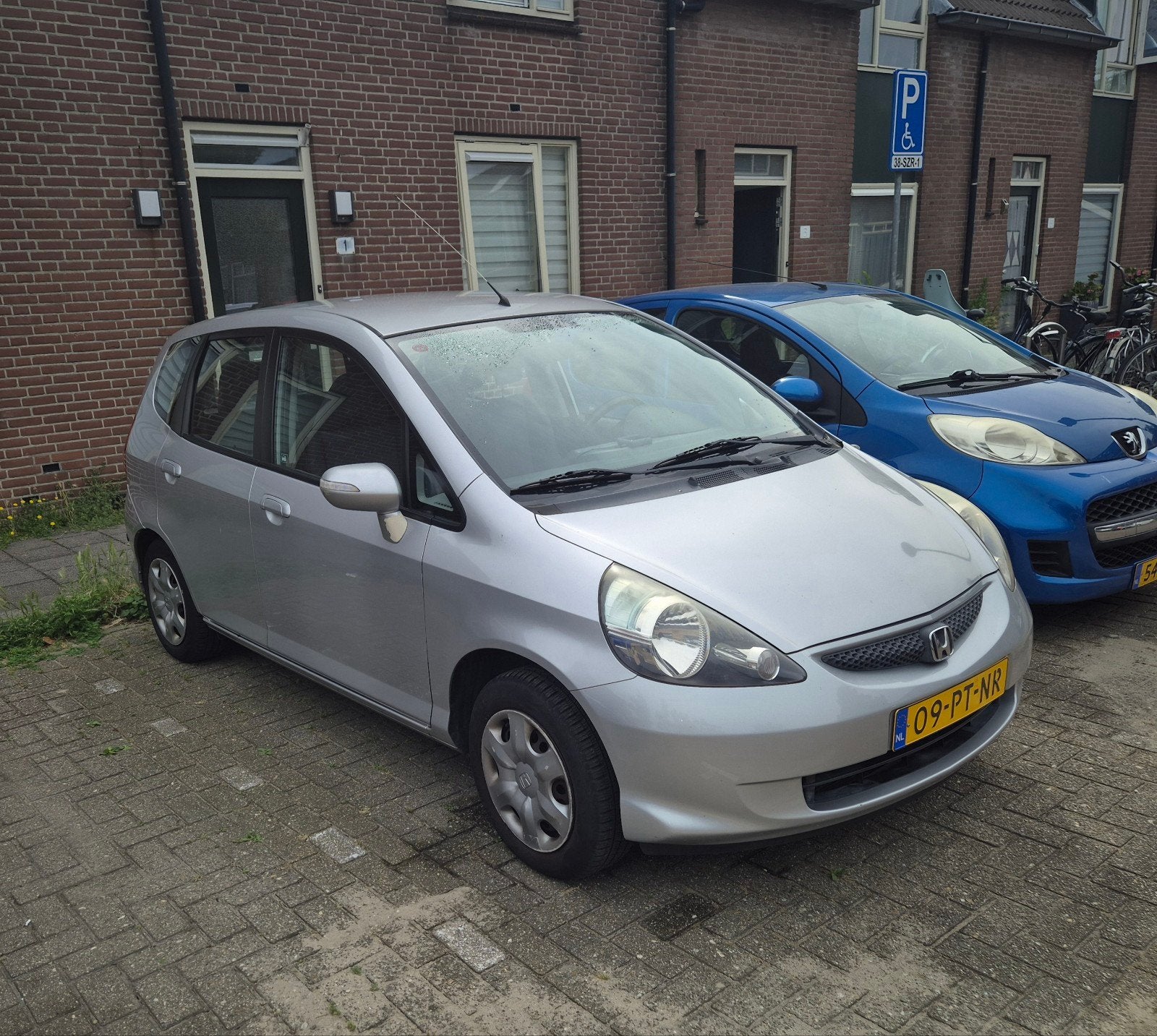 Nette Honda Jazz 1.4I LS 2004 Grijs AIRCO, Auto's, Honda, Voorwielaandrijving, 83 pk, 40 €/maand, 4 cilinders