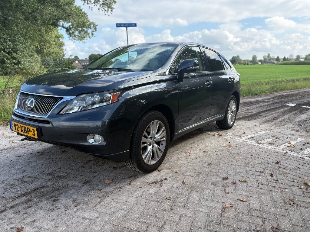 Lexus RX(-H) 450h Hybrid 299pk CVT 2009 Grijs | Schade |, Auto's, Automaat, Dealer onderhouden, 249 pk, Beige
