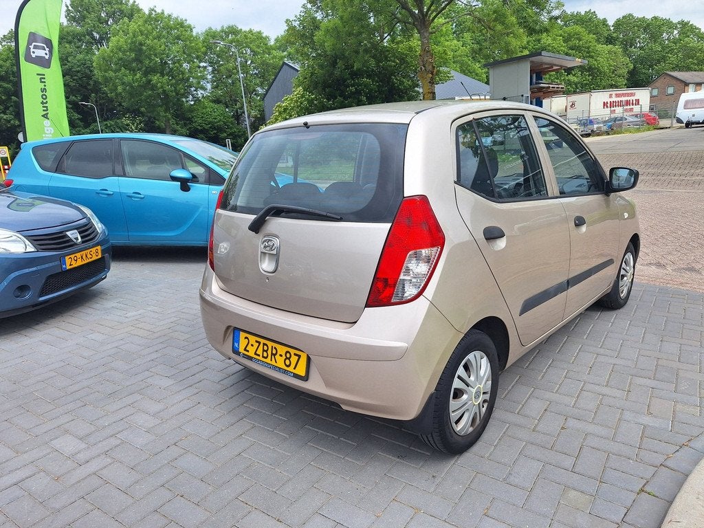 Hyundai I10 1.1 Active Cool / Super zuinig / Slechts 106.394, Auto's, Hyundai, Voorwielaandrijving, Gebruikt, 31 €/maand, Bruin