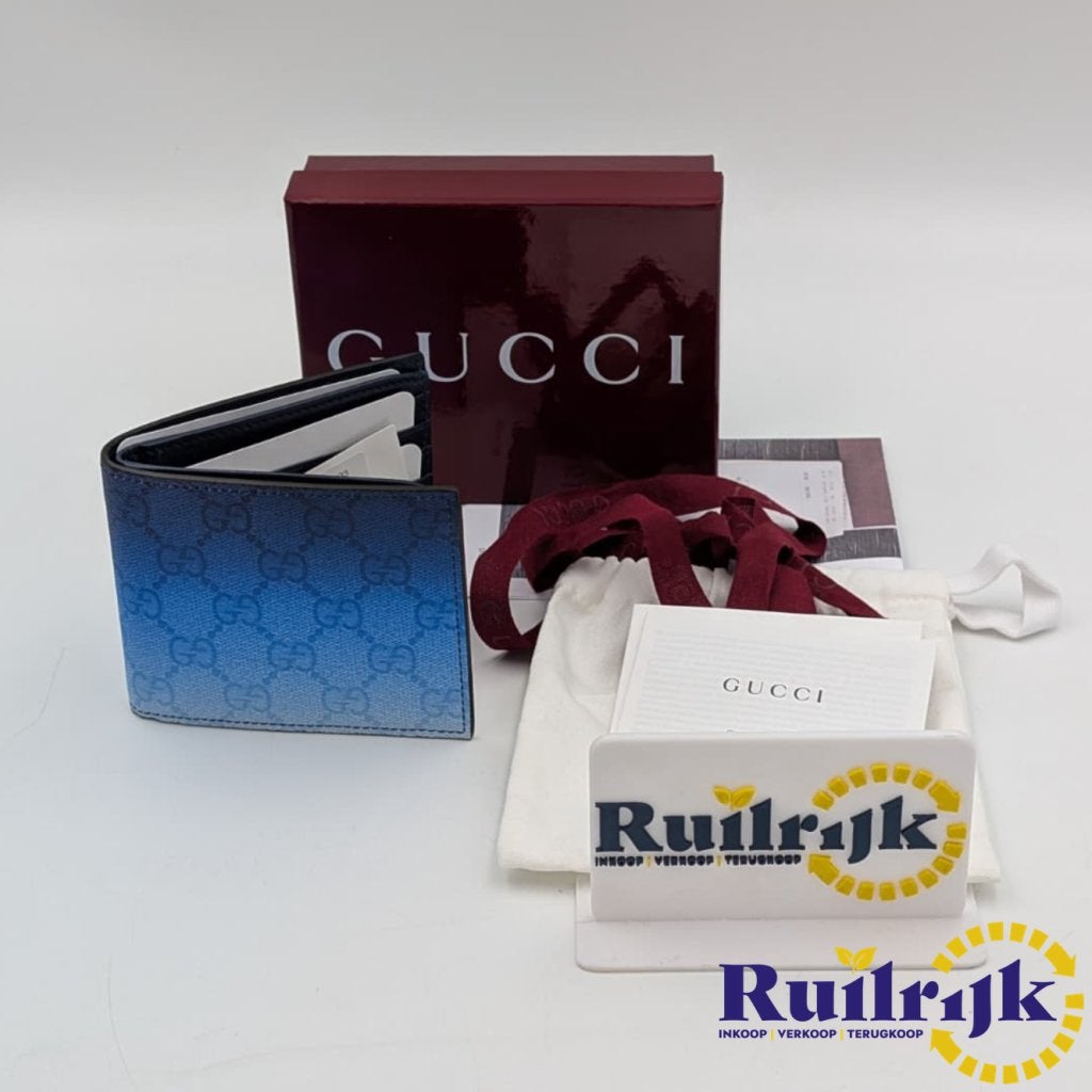 Gucci Chroma bi-fold portemonnee blauw - Nieuw met bon, Sieraden, Tassen en Uiterlijk, Gucci, Nieuw, Support@gucci.com, 30 Avenue Montaigne
75008 Paris