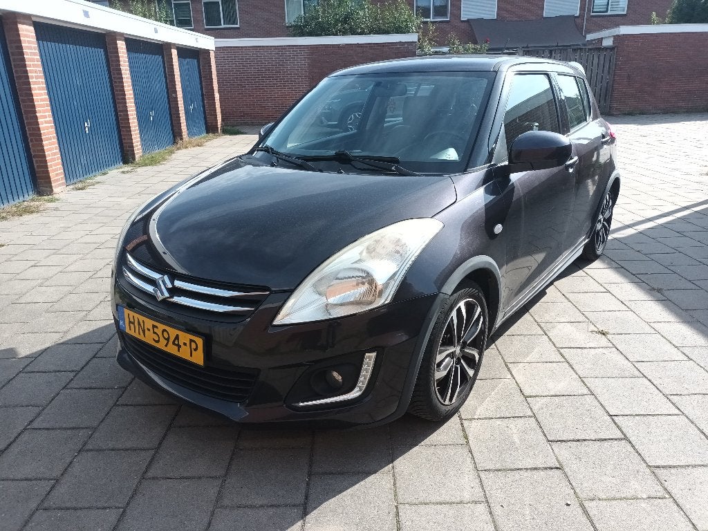 Suzuki Swift 1.2 5D 2015 Grijs, Auto's, 4 cilinders, 400 kg, Origineel Nederlands, Handgeschakeld