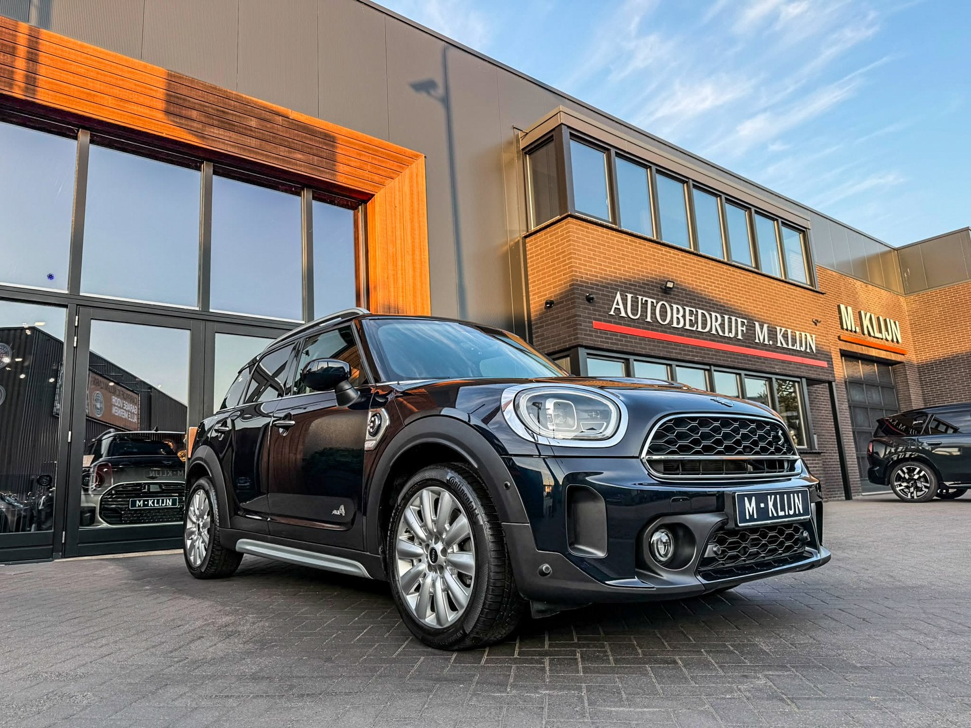 MINI Countryman Cooper S E ALL4 ALL4 aut 220pk/Loune leer/Ca, Auto's, Mini, Automaat, Gebruikt, Met garantie (alle), Zwart