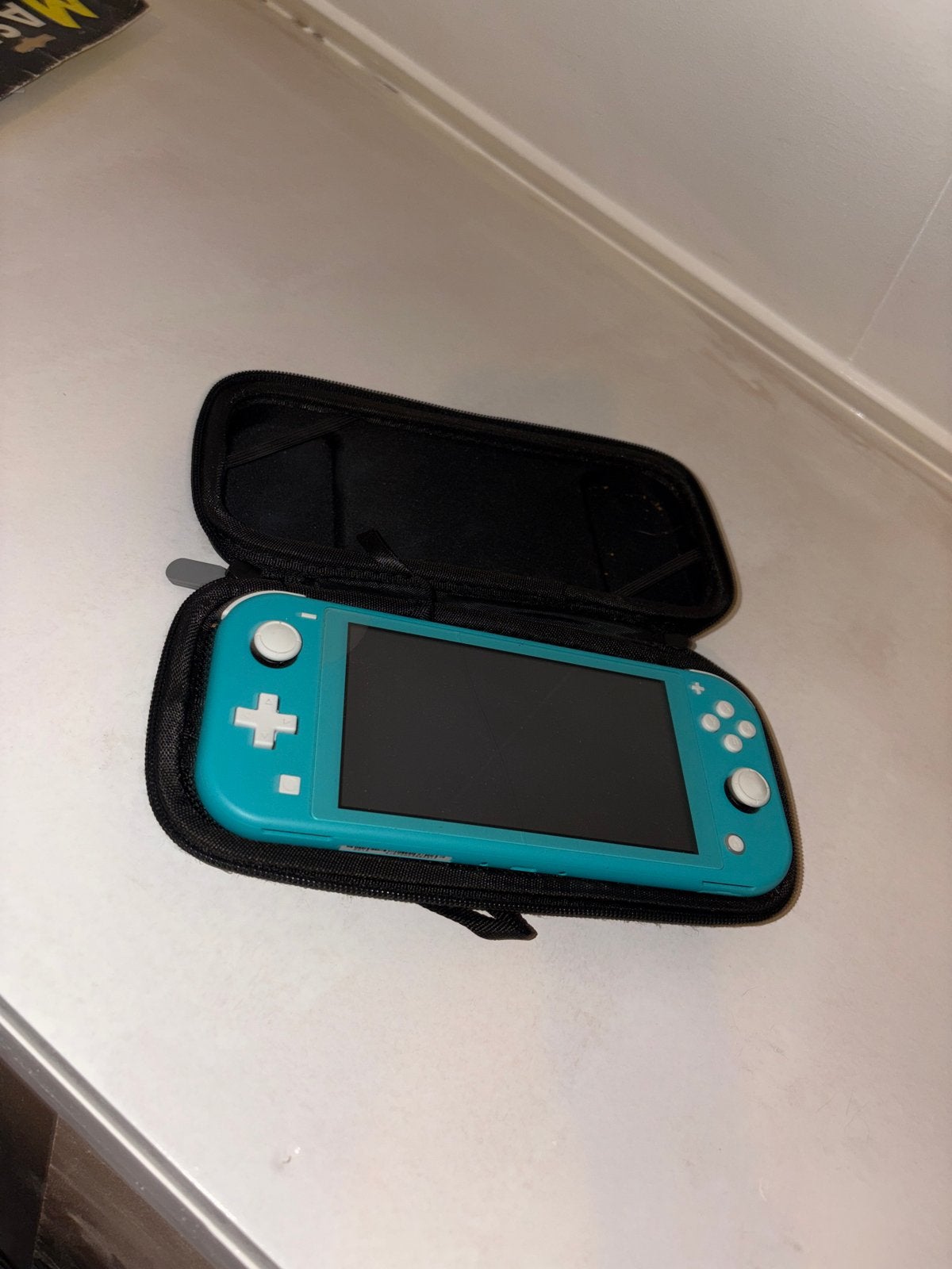 Nintendo Switch Lite Turquoise met beschermhoes, Spelcomputers en Games, Ophalen of Verzenden, Turquoise, Zo goed als nieuw, Met beschermhoes of tas