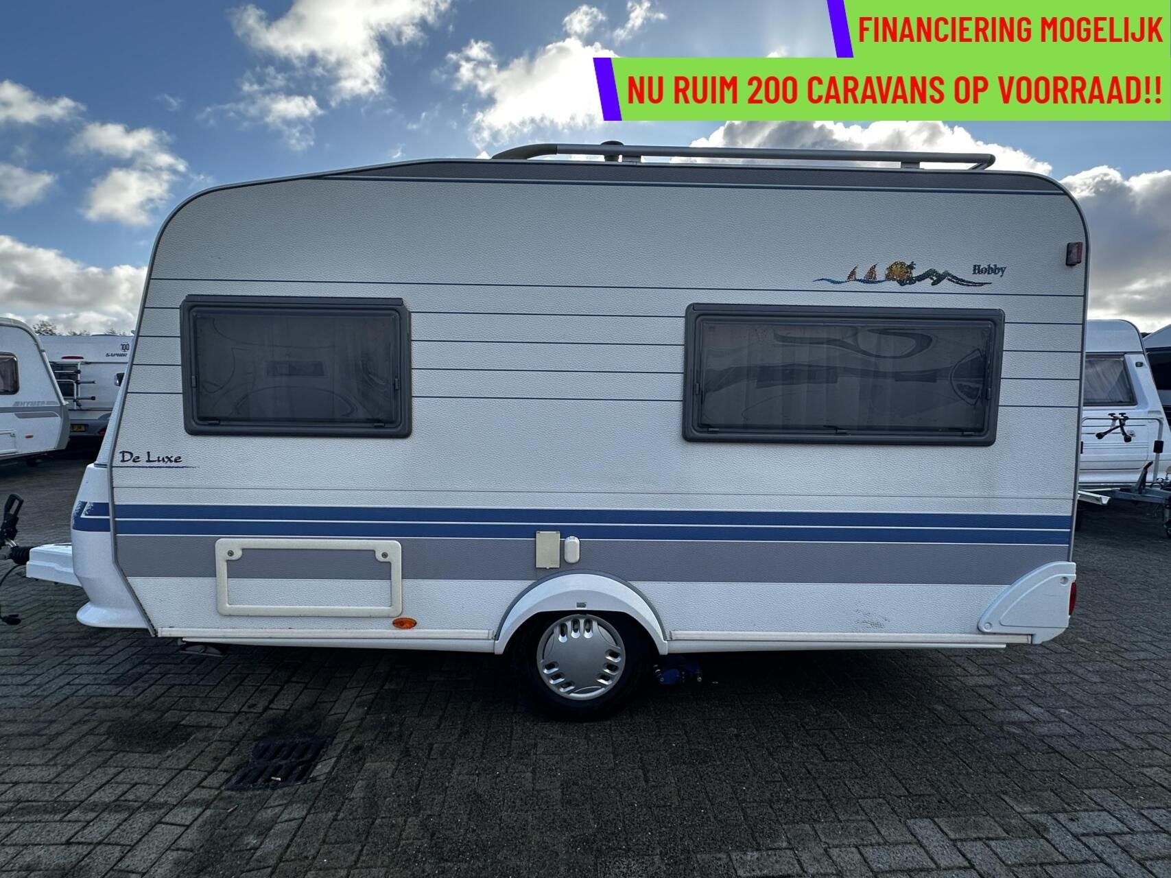 Hobby 400 SF DE LUXE DWARSBED,TOILET,TREINZIT, FIETSENDRAGER, Caravans en Kamperen, Caravans, Mover, Hobby, Bedrijf, 750 - 1000 kg