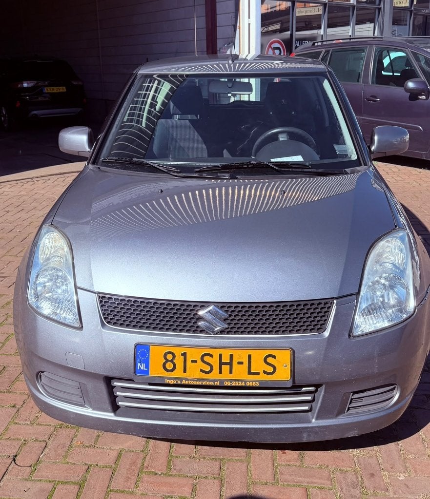Suzuki Swift 1.3 3D 2006 Grijs +APK, Auto's, Stof, 31 €/maand, Swift, Origineel Nederlands
