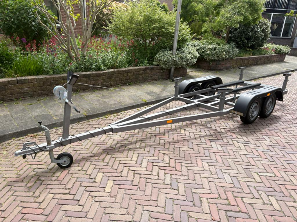 Dubbelasser boot trailer tandemasser motorboot rib 5,70 M., Ophalen, Dubbelassig (tandemas), Gebruikt, 1500 tot 3000 kg