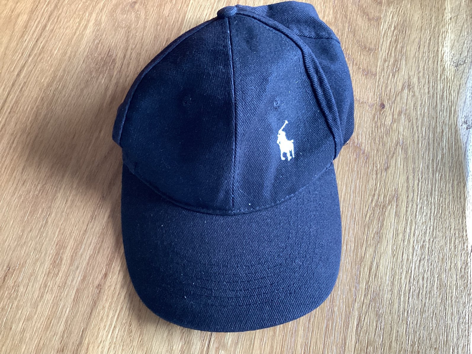 Te koop zwarte  mc gregor pet verstelbaar, Ophalen of Verzenden, Zo goed als nieuw