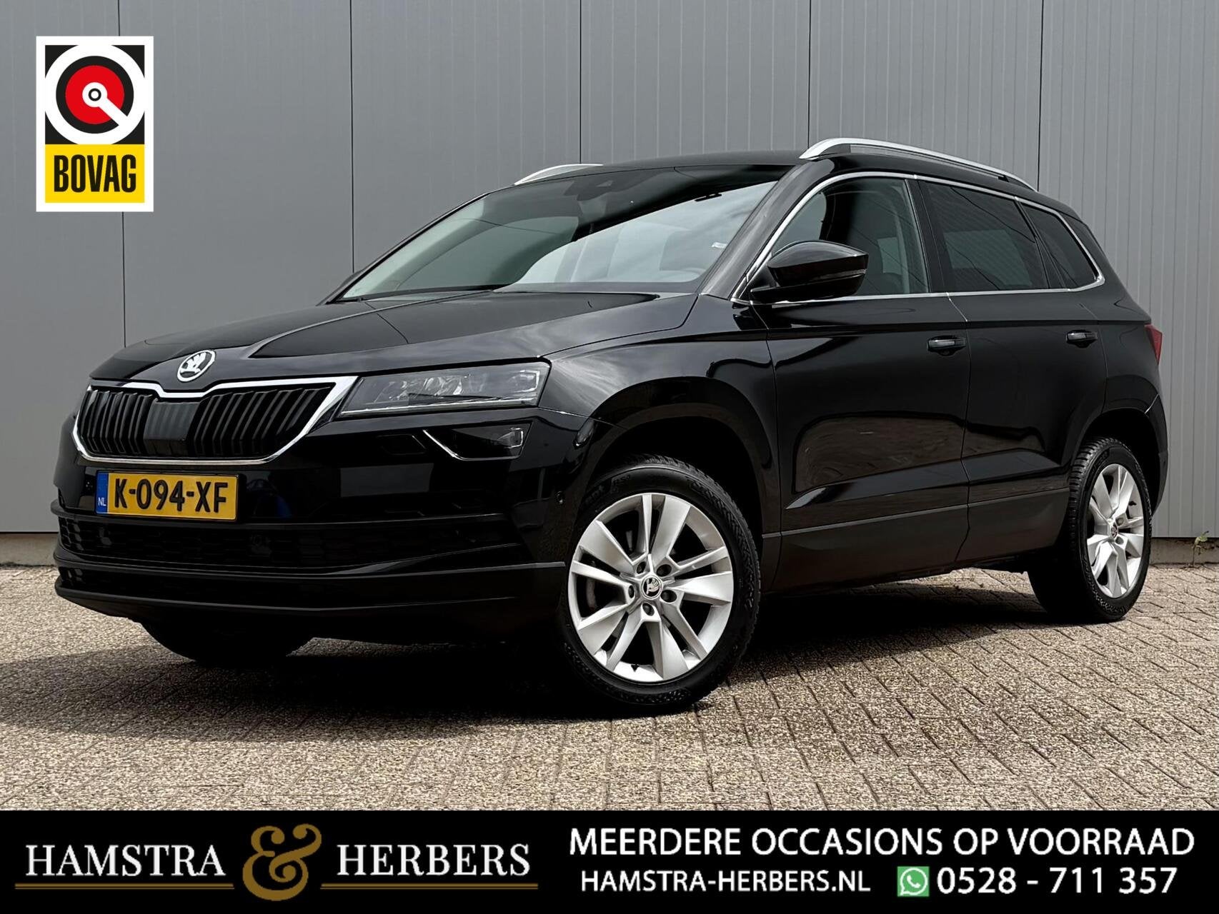Skoda Karoq 1.0 TSI Business Edition Plus zwart, Auto's, Voorwielaandrijving, Gebruikt, Zwart, Handgeschakeld