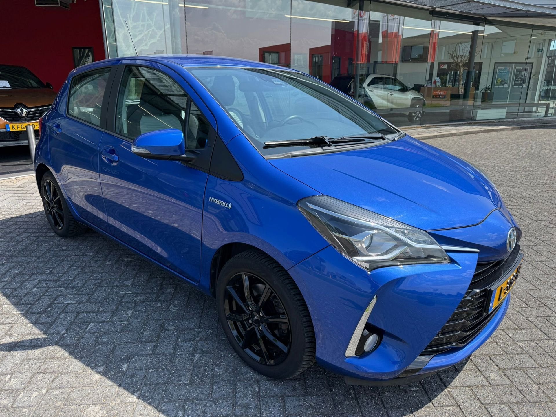 Toyota Yaris 1.5 Hybrid Dynamic, Auto's, 12 maanden, 4 cilinders, Blauw, Bedrijf