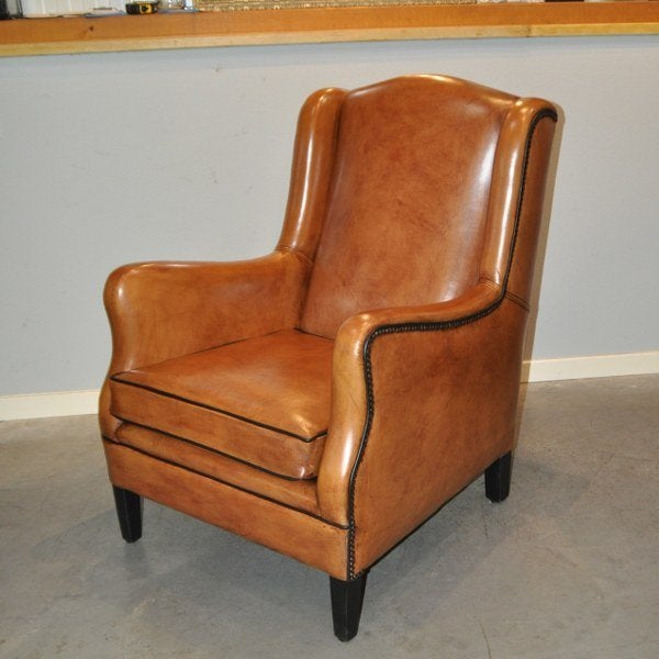 Nieuwe smalle schapenleren fauteuil Mirjam, Huis en Inrichting, Nieuw, Ophalen of Verzenden, 50 tot 75 cm, Leer