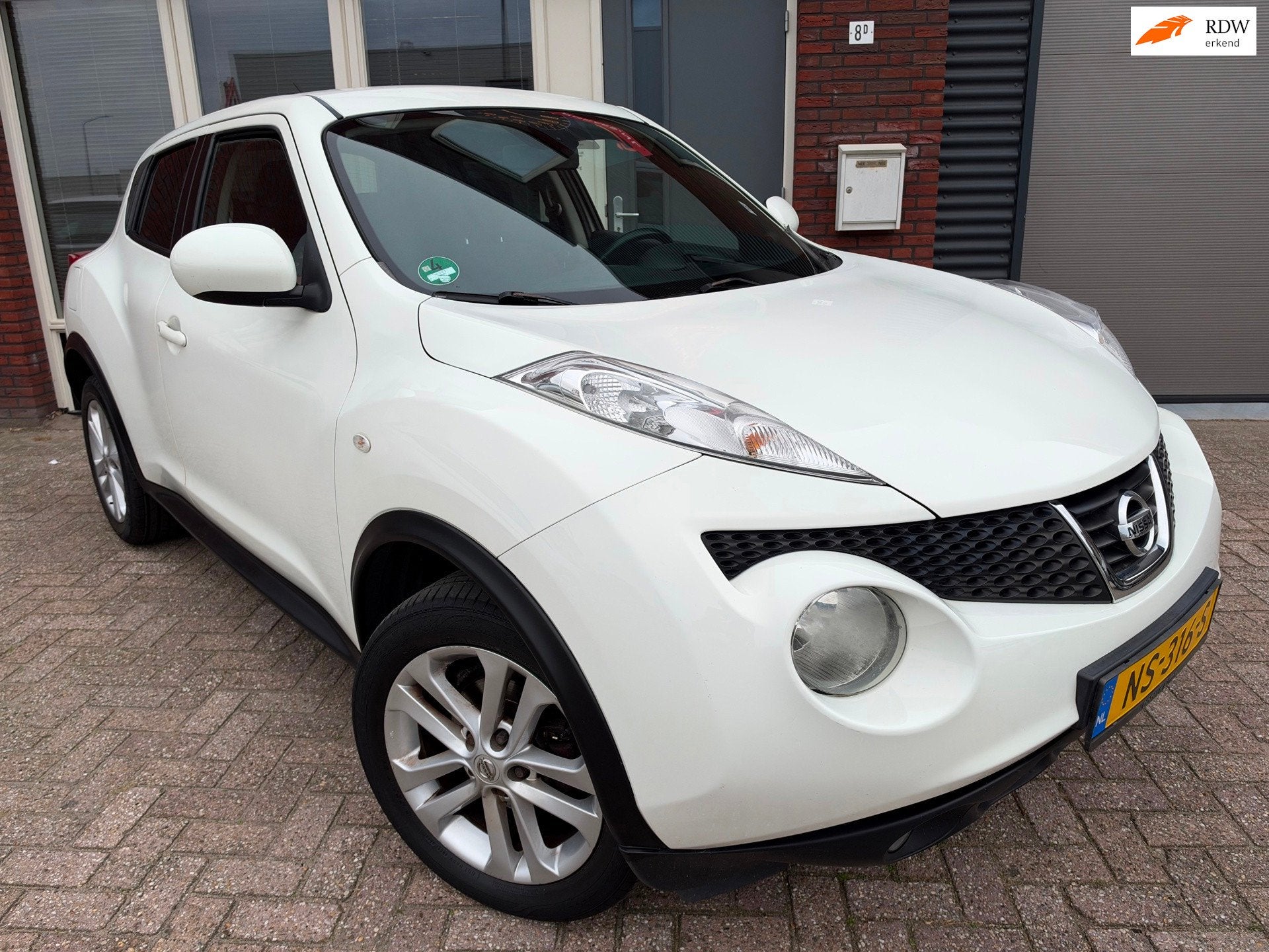 Nissan Juke 1.6 Tekna / AUT / Navi / Camera / Clima / Stoelv, Auto's, Euro 5, Stof, 4 cilinders, Met garantie (alle)