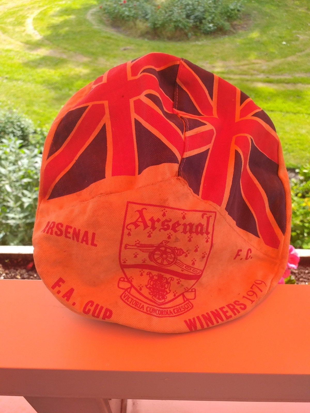 Origineel Arsenaal pet, Ophalen