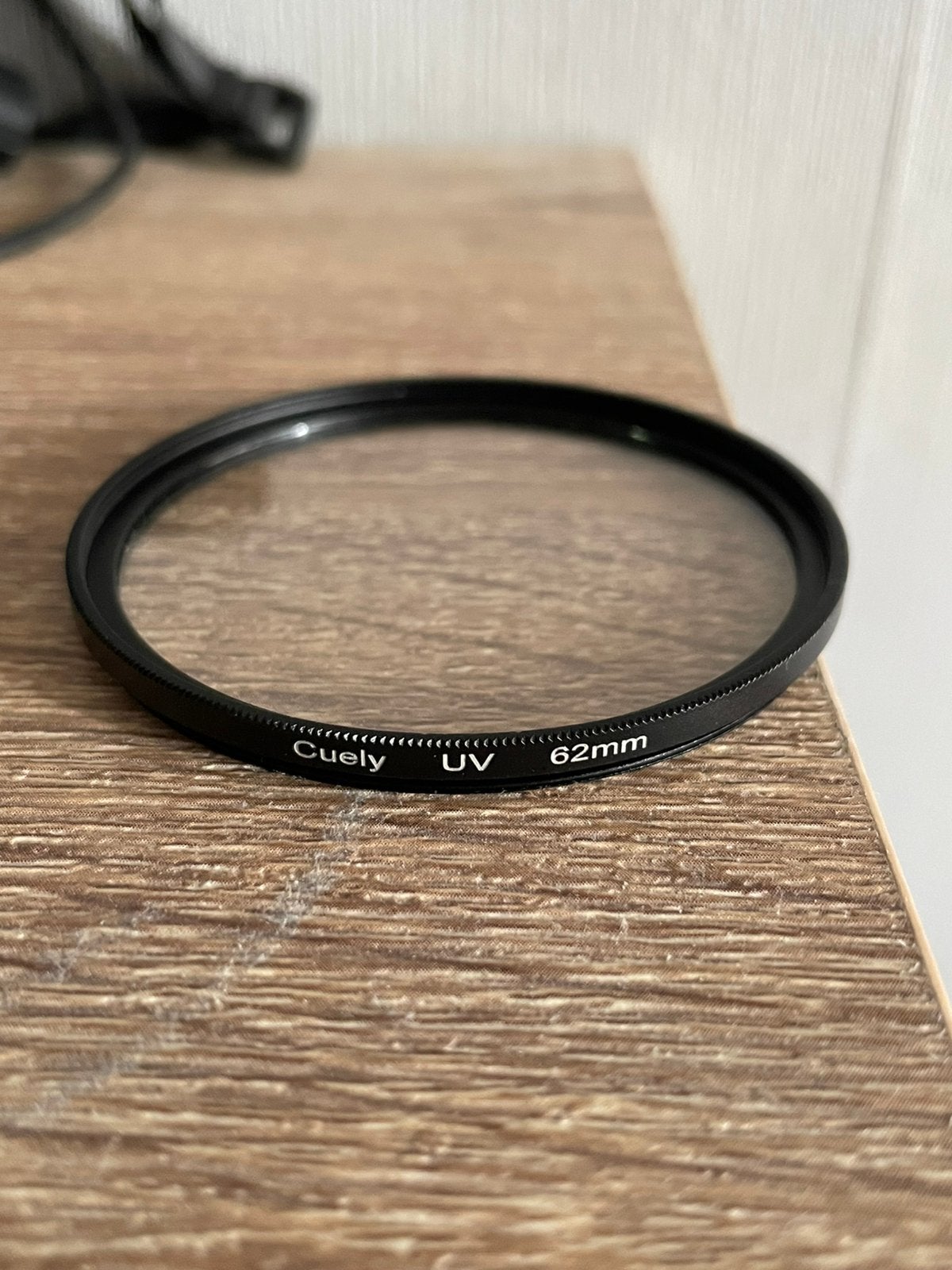 Cuely 62mm UV filter, Ophalen, Zo goed als nieuw, 60 tot 70 mm, UV-filter