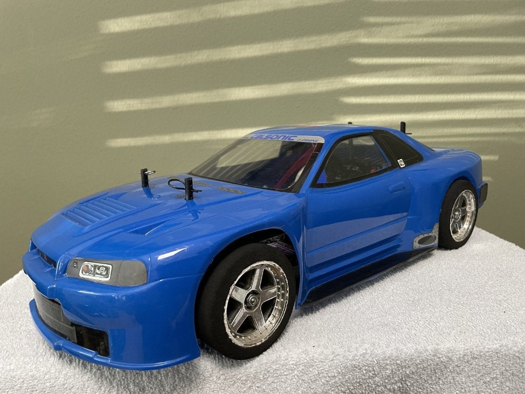 Tamiya 1:10 – Nissan Skyline GT-R Calsonic, TA-04 S chassis, Hobby en Vrije tijd, Modelbouw | Radiografisch | Auto's, Zo goed als nieuw