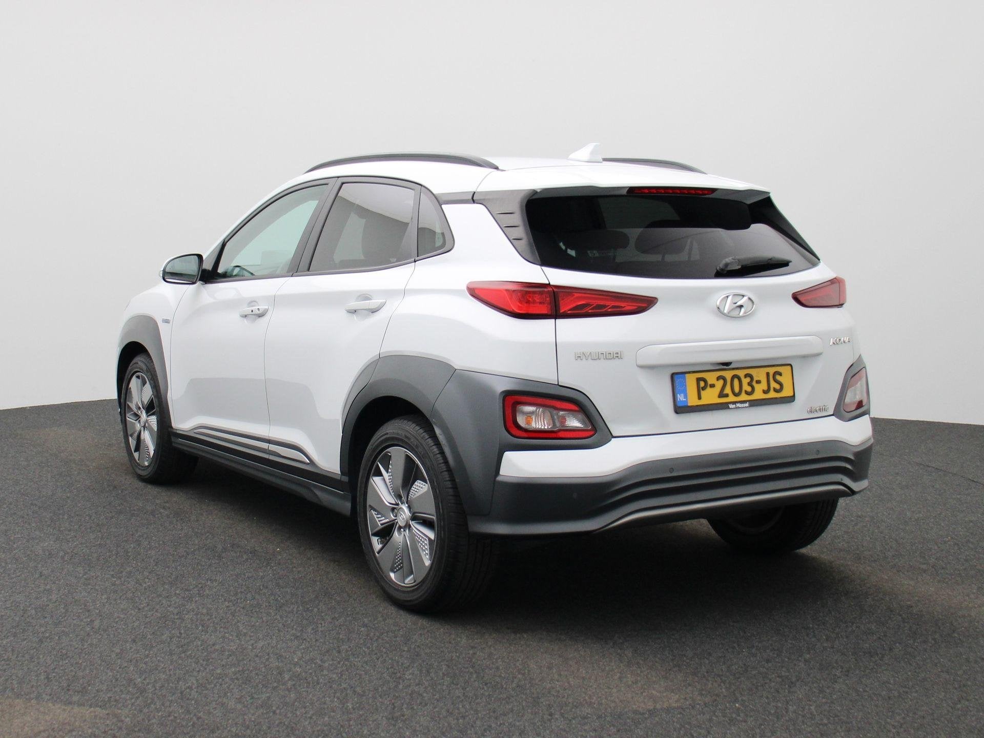 Hyundai Kona EV Fashion 64 kWh | SOH 100% | Apple Carplay /, 12 maanden, Gebruikt, Leder en Stof, Wit