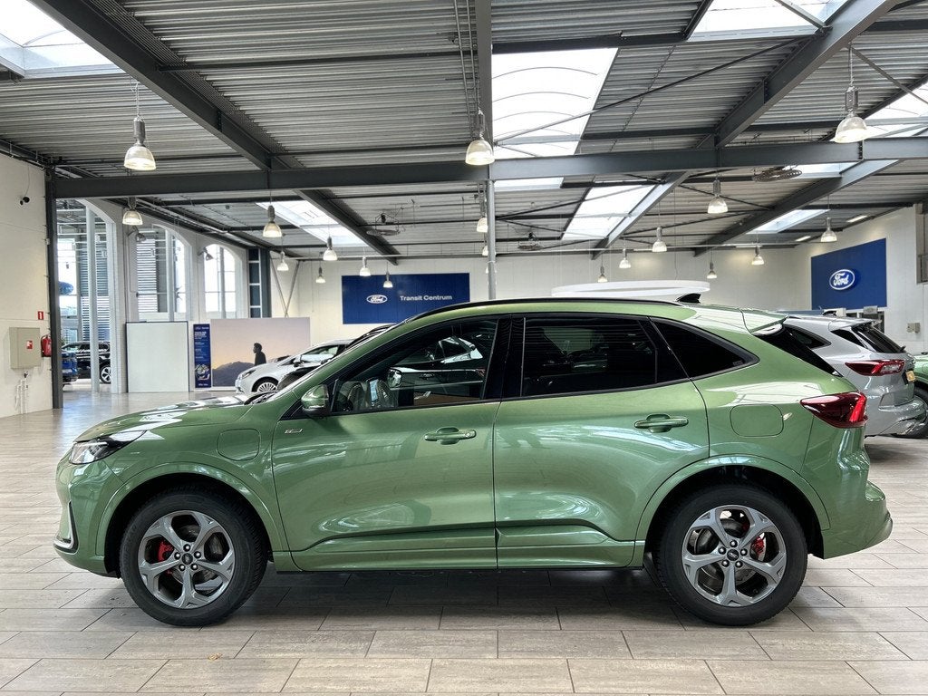 Ford Kuga 2.5 PHEV 243 pk ST-Line X | Trekhaak I AGR stoelen, Auto's, Ford, 12 maanden, Gebruikt, Zwart, Bedrijf