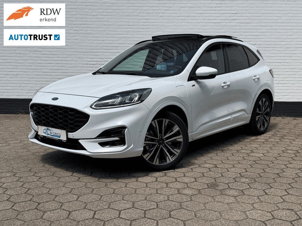 Ford Kuga PHEV ST-Line X l PANO l TREKHAAK l ACC l TOPSTAAT!, Auto's, Ford, Gebruikt, Zwart, 4 cilinders, Wit
