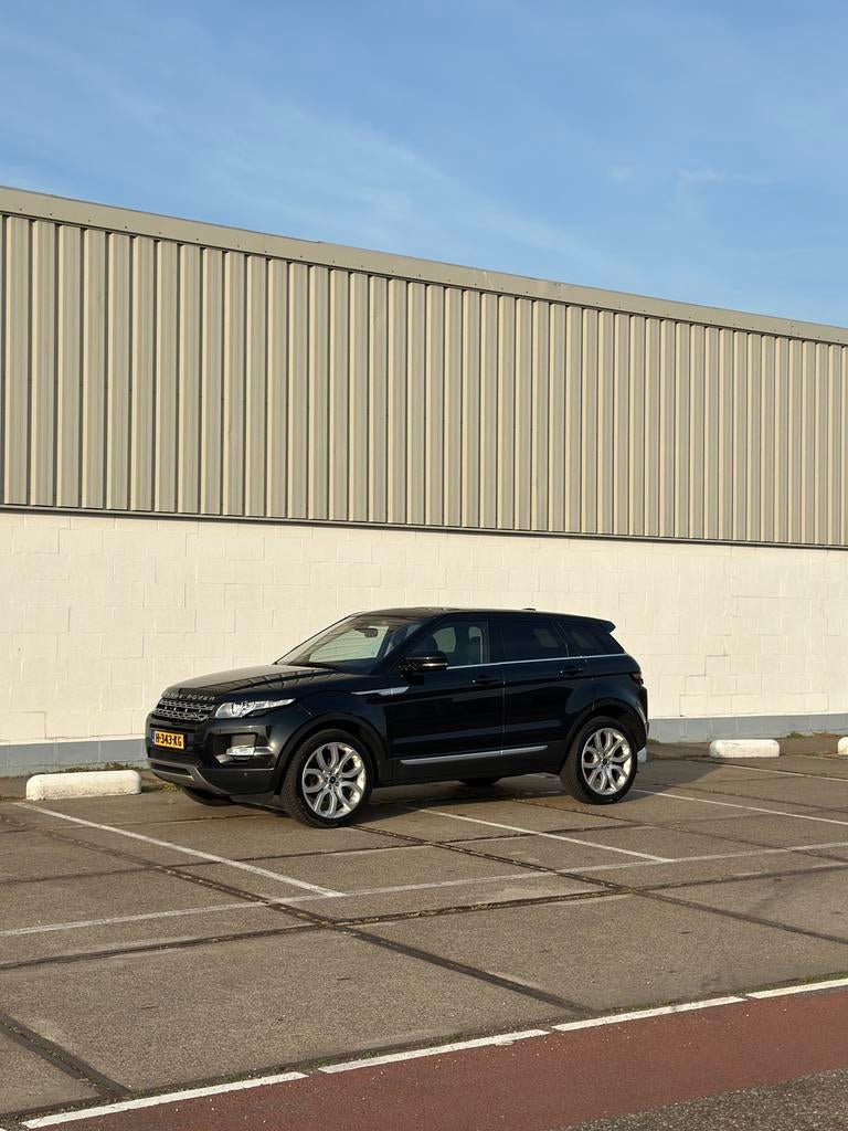 Range Rover Evoque 2013 | Santorini Black | APK | Leder, Euro 5, 1800 kg, Zwart, Zwart