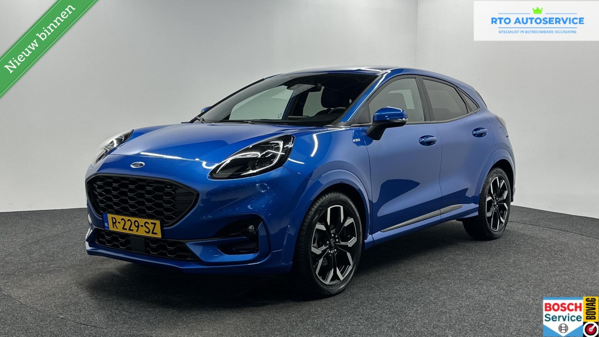 Ford Puma 1.0 EcoBoost Hybrid ST-Line X TREKHAAK CARPLAY NAV, Auto's, Ford, Voorwielaandrijving, Met garantie (alle), Blauw, Leder en Stof