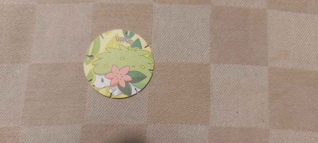 flippo pokemon chiki balls zeldzaam Shaymin, Ophalen of Verzenden, Losse flippo's