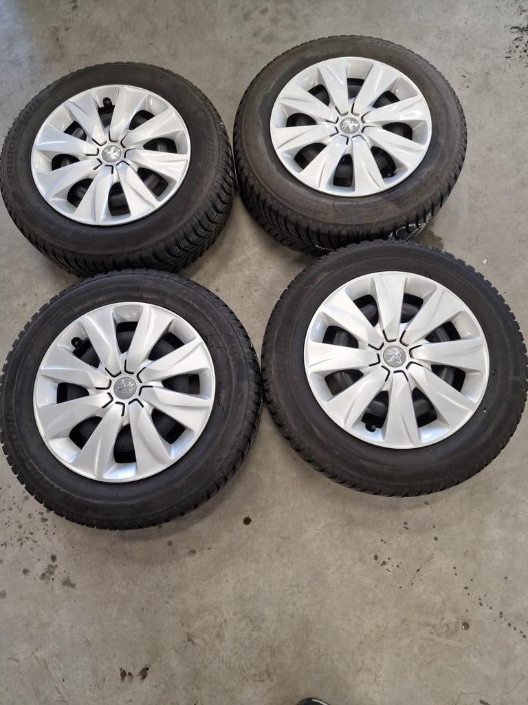Set winterwielen Peugeot 208, Ophalen