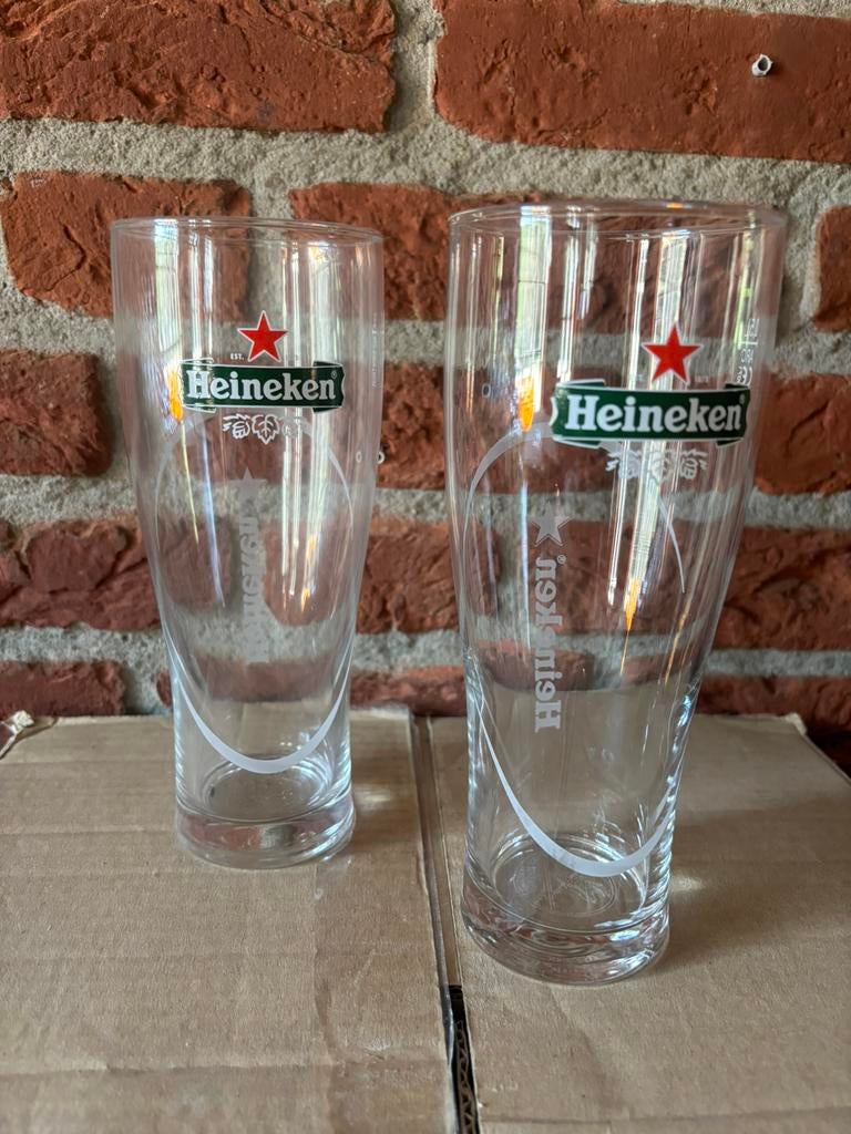 Heineken glazen 0,5 l 22st, Ophalen of Verzenden, Zo goed als nieuw, Glas of Glazen, Heineken