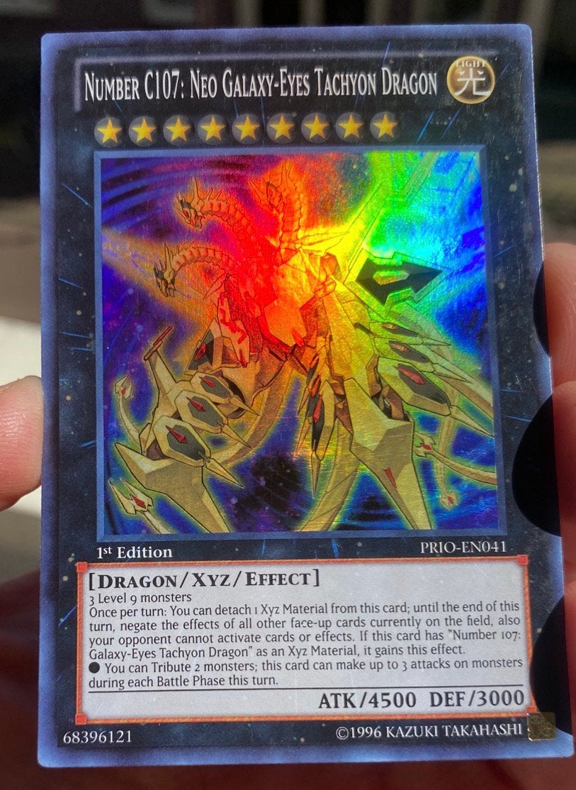 Yu-Gi-Oh! Number C107: Neo Galaxy-Eyes Tachyon Dragon PRIO !, Ophalen of Verzenden, Zo goed als nieuw, Losse kaart, Foil