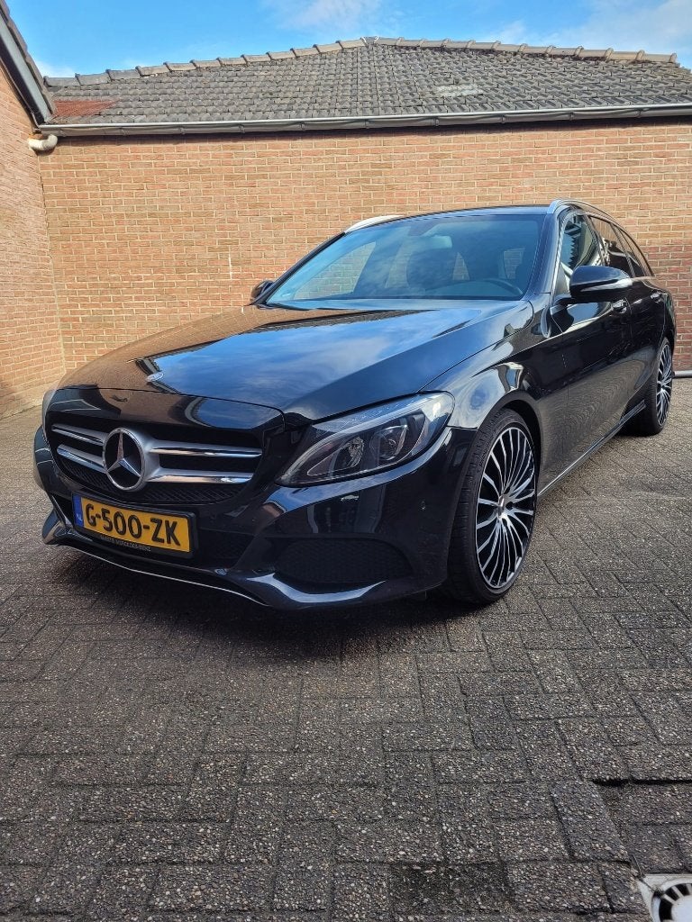 Mercedes-Benz C-Klasse C180 Estate 1.6  Automaat, Auto's, 745 kg, 1800 kg, Zwart, Leder en Stof