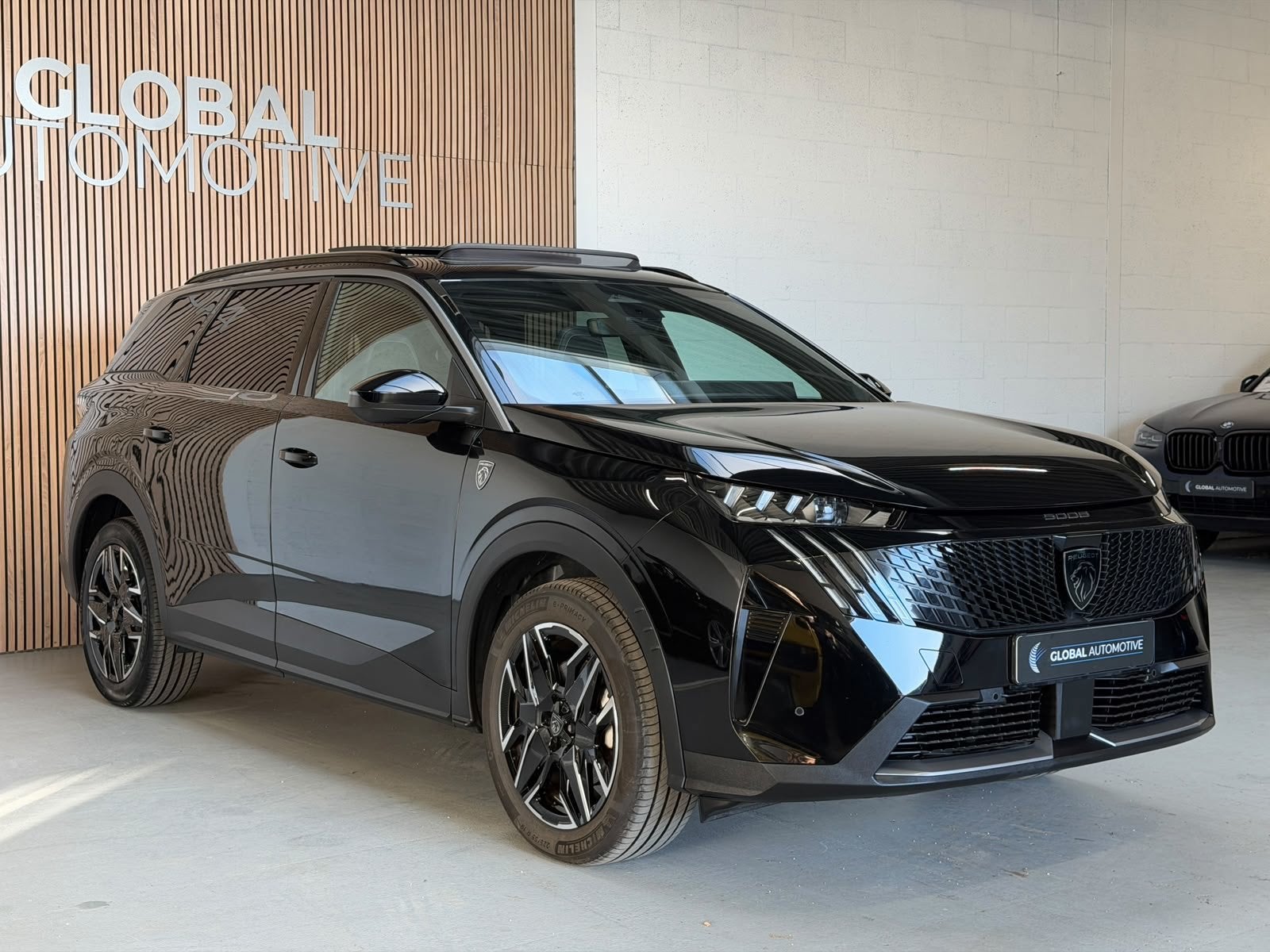 Peugeot 5008 1.2 Hybrid 145 GT Exclusive 7p - PANORAMADAK -, Auto's, 145 pk, Gebruikt, Zwart, 1199 cc