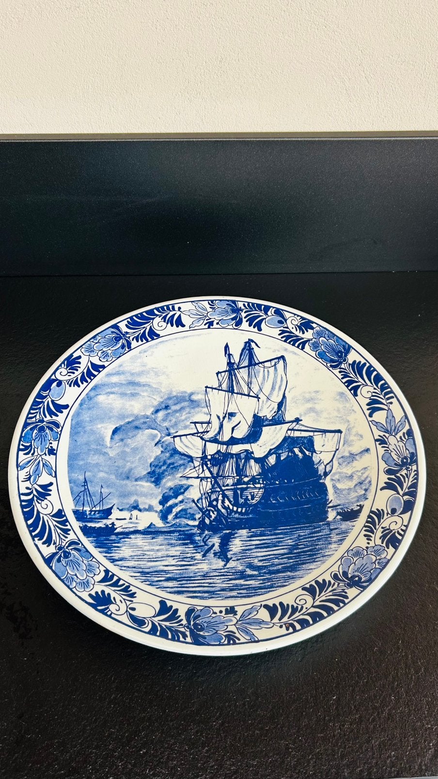 Delfts blauw wandbord, Ophalen