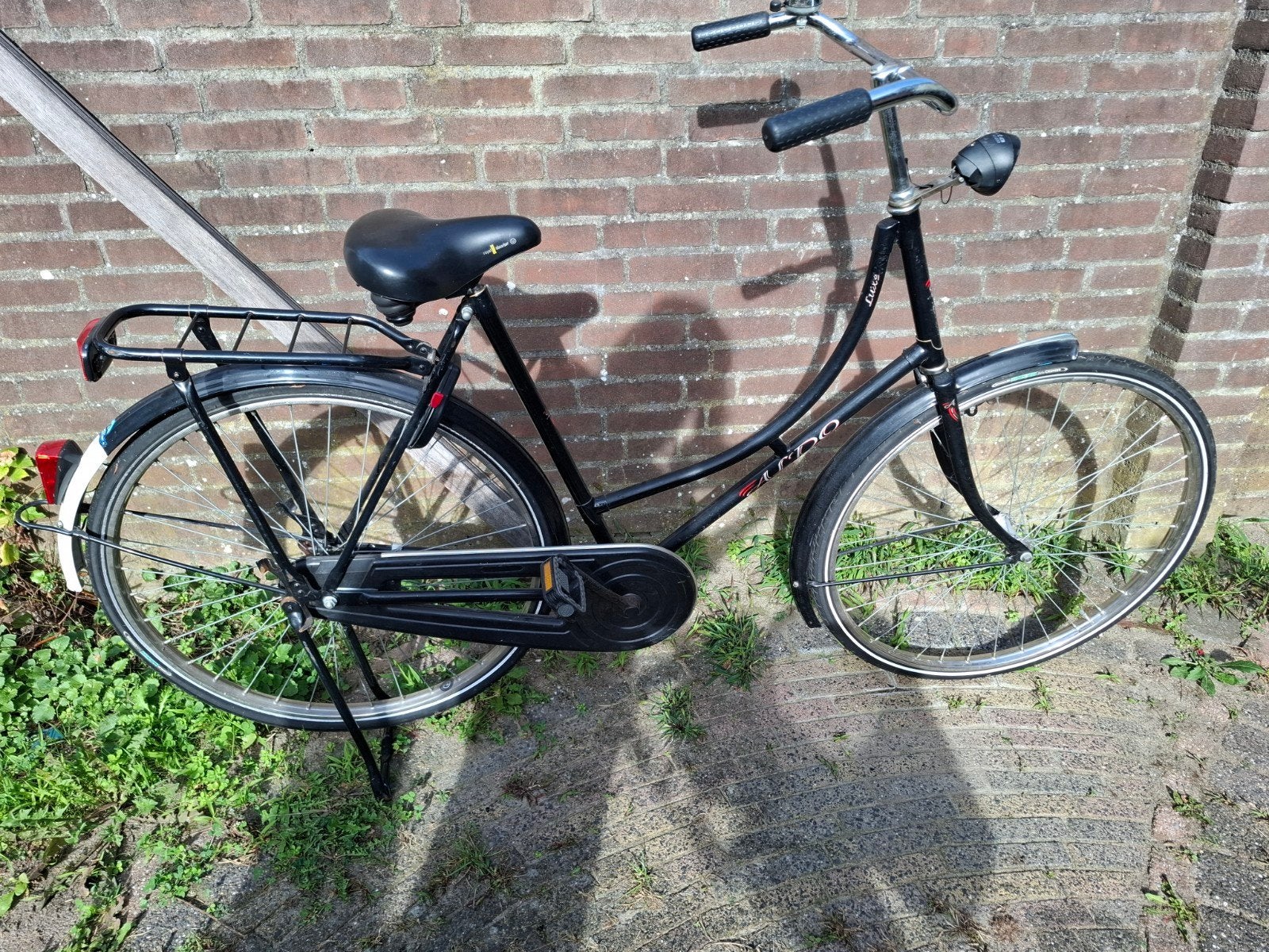 Zwarte damesfiets met lekke achterband, Fietsen en Brommers, Ophalen, Gebruikt, Overige merken