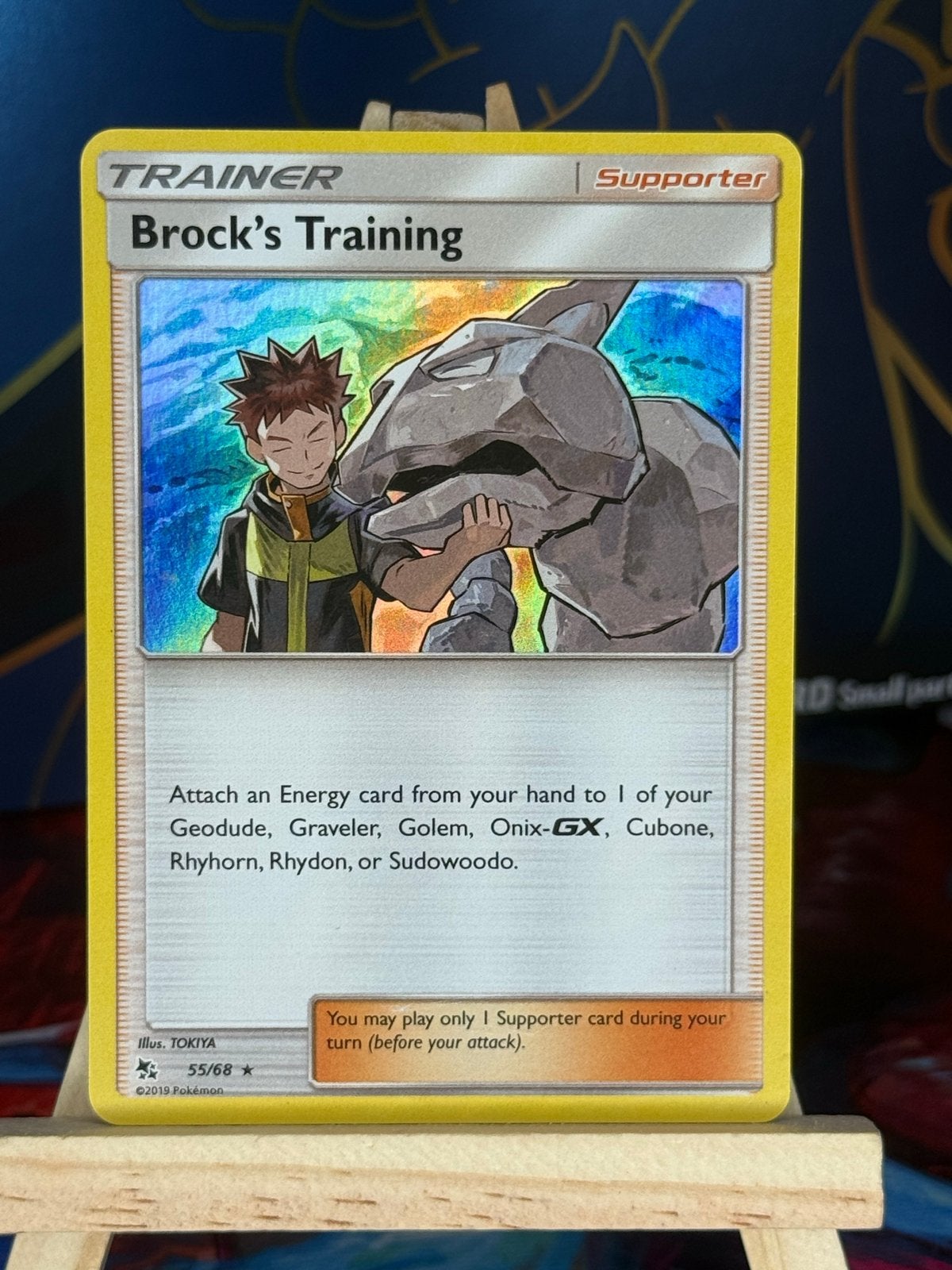 Brock's Training #55 | Pokemon Hidden Fates, Ophalen of Verzenden, Zo goed als nieuw, Losse kaart, Foil