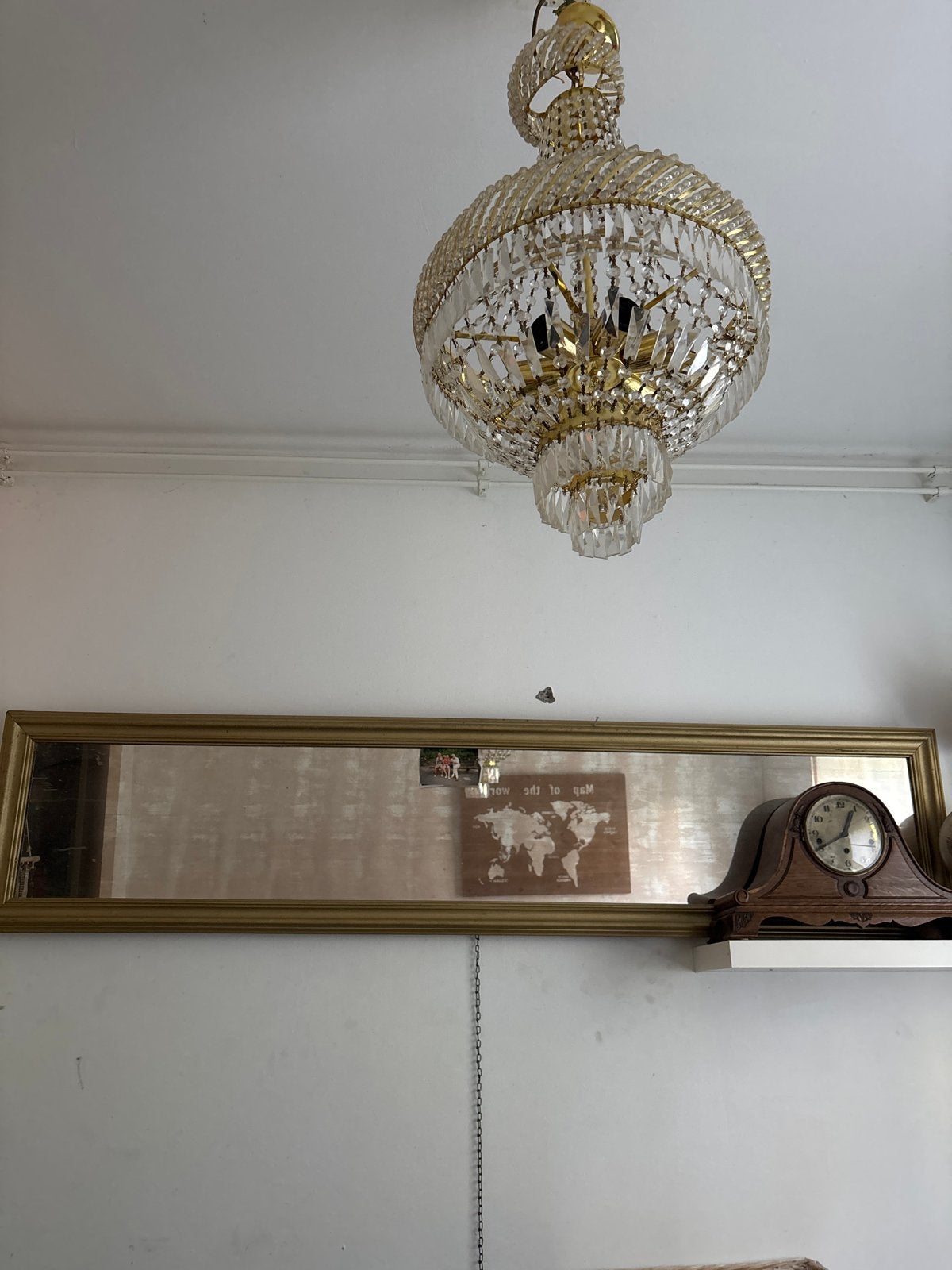 Grote spiegel met gouden lijst, Ophalen