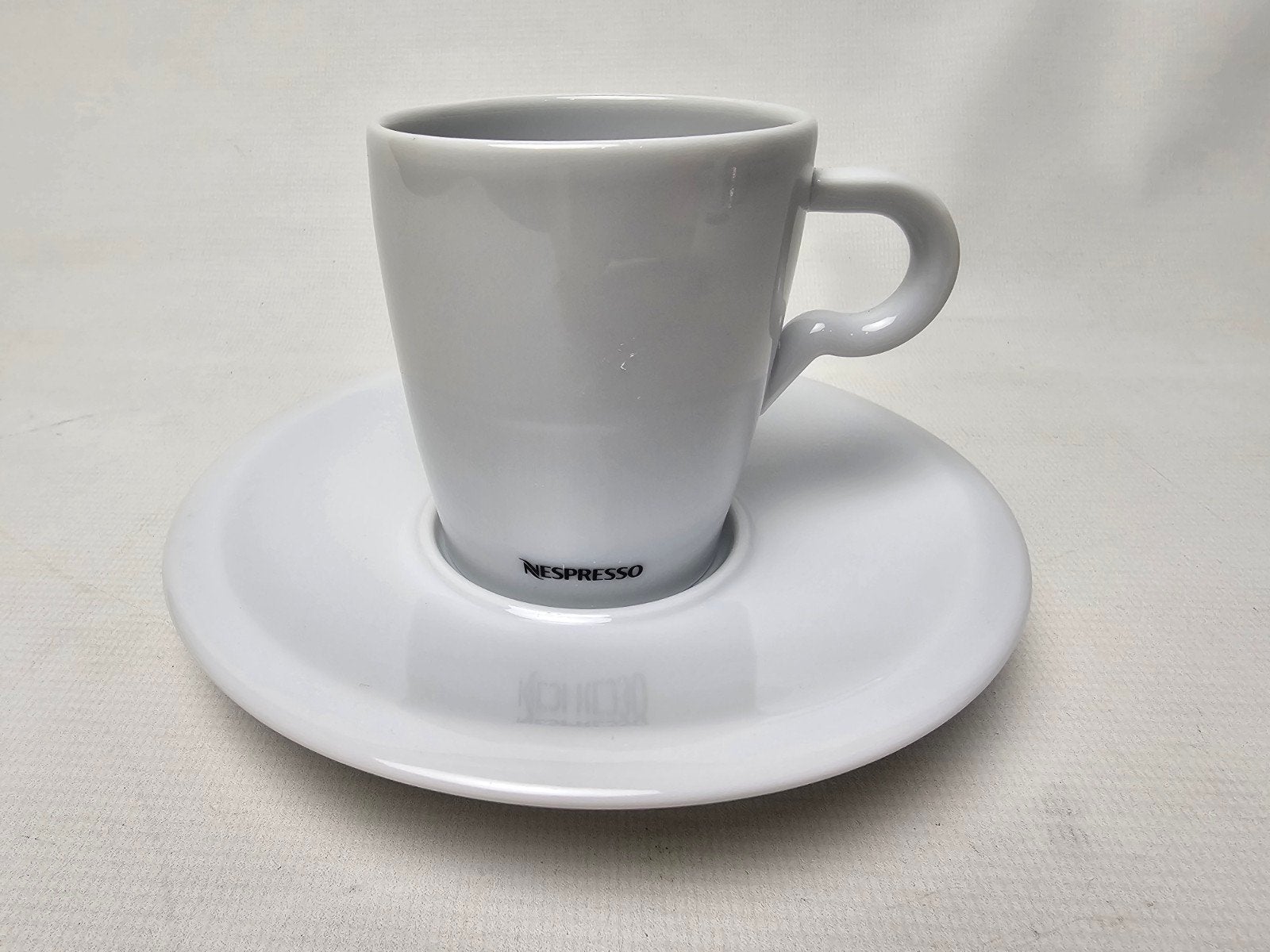 # Nespresso koffie kop en schotel, Gebruikt, Overige merken, Ophalen of Verzenden, Overige stijlen