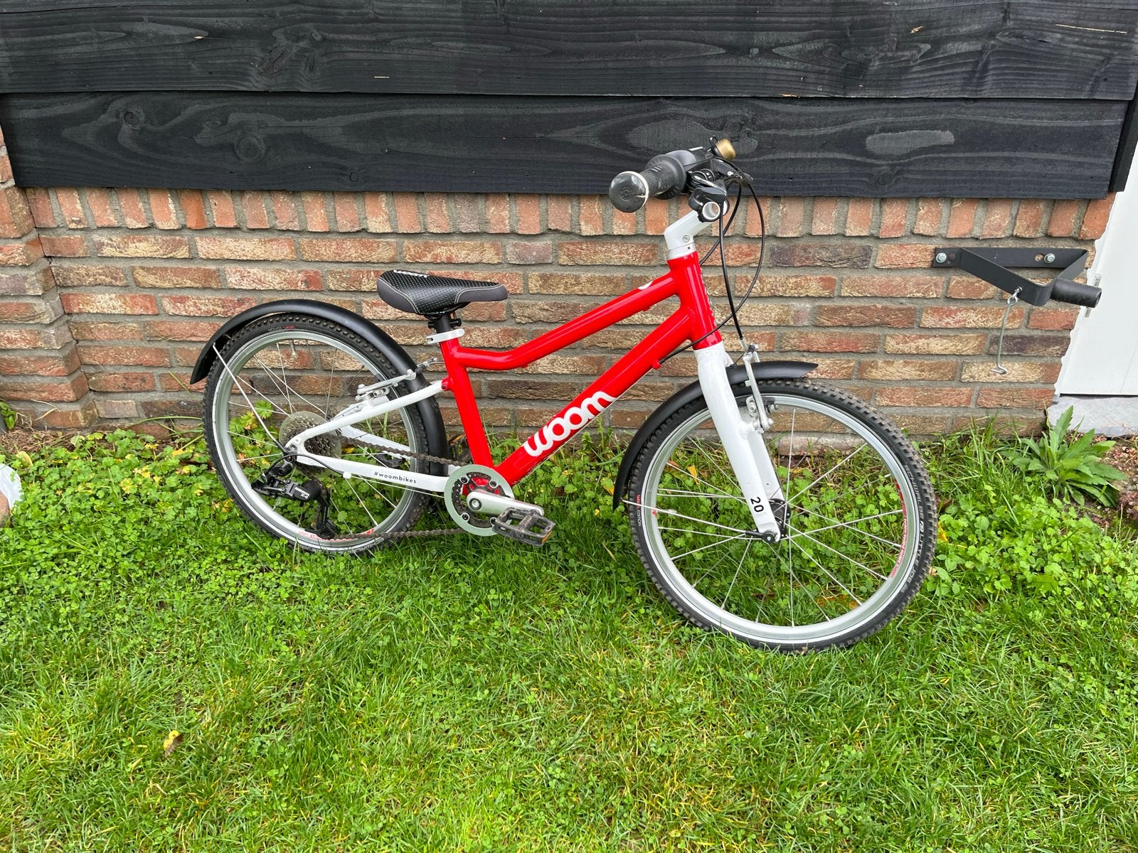 Woom 4 kinderfiets, Ophalen, Gebruikt, Velgrem, 20 inch of meer