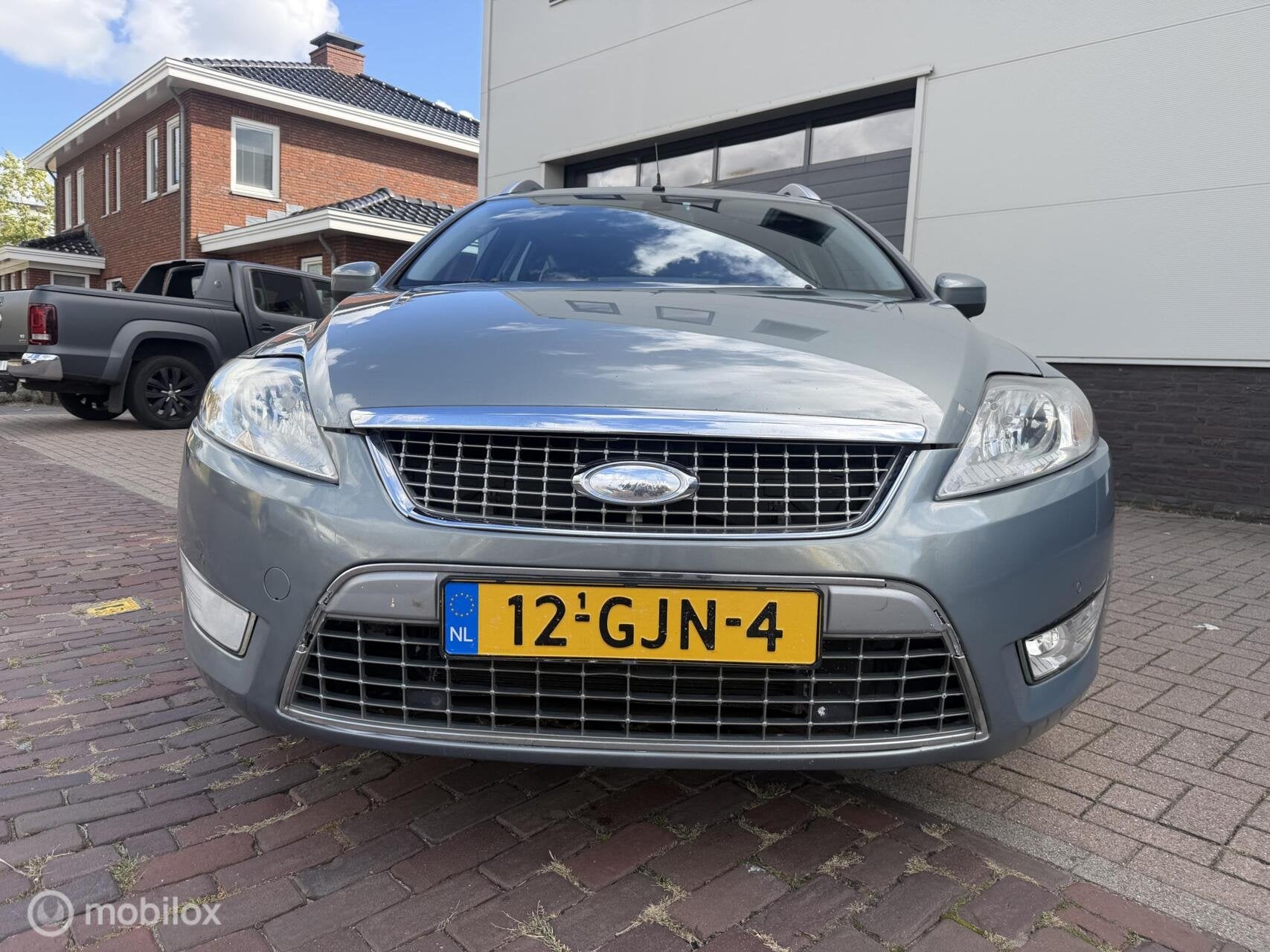 Ford Mondeo Wagon 2.3-16V Titanium AUTOMAAT/NAVI/TREKHAAK, Auto's, Gebruikt, 4 cilinders, Mondeo, 160 pk
