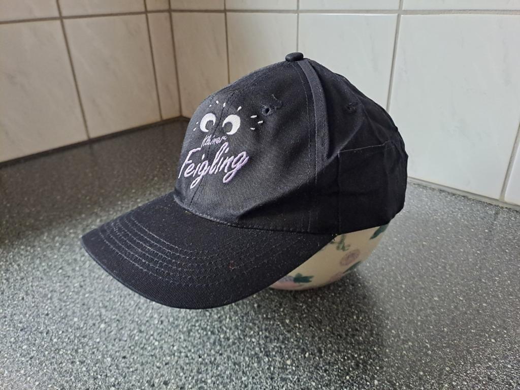 Kleiner feigling cap pet zwart, Verzamelen, Gebruiksvoorwerp, Ophalen of Verzenden, Zo goed als nieuw, N.v.t
