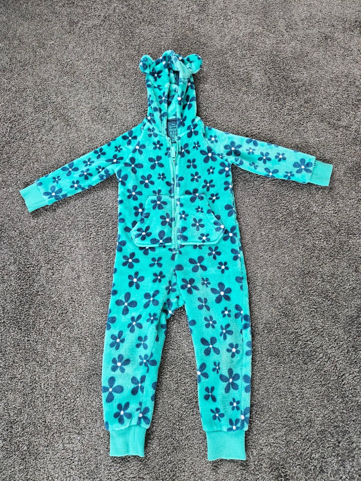 WE fleece onesie met bloemenprint - maat 98/104, Ophalen of Verzenden, Gebruikt, WE, Jongen of Meisje