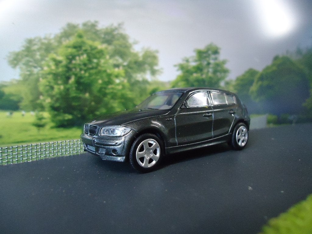 BMW E87 1 Serie - New Ray antracietzwart-metallic, Hobby en Vrije tijd, Ophalen of Verzenden, Gebruikt, Auto, Overige merken