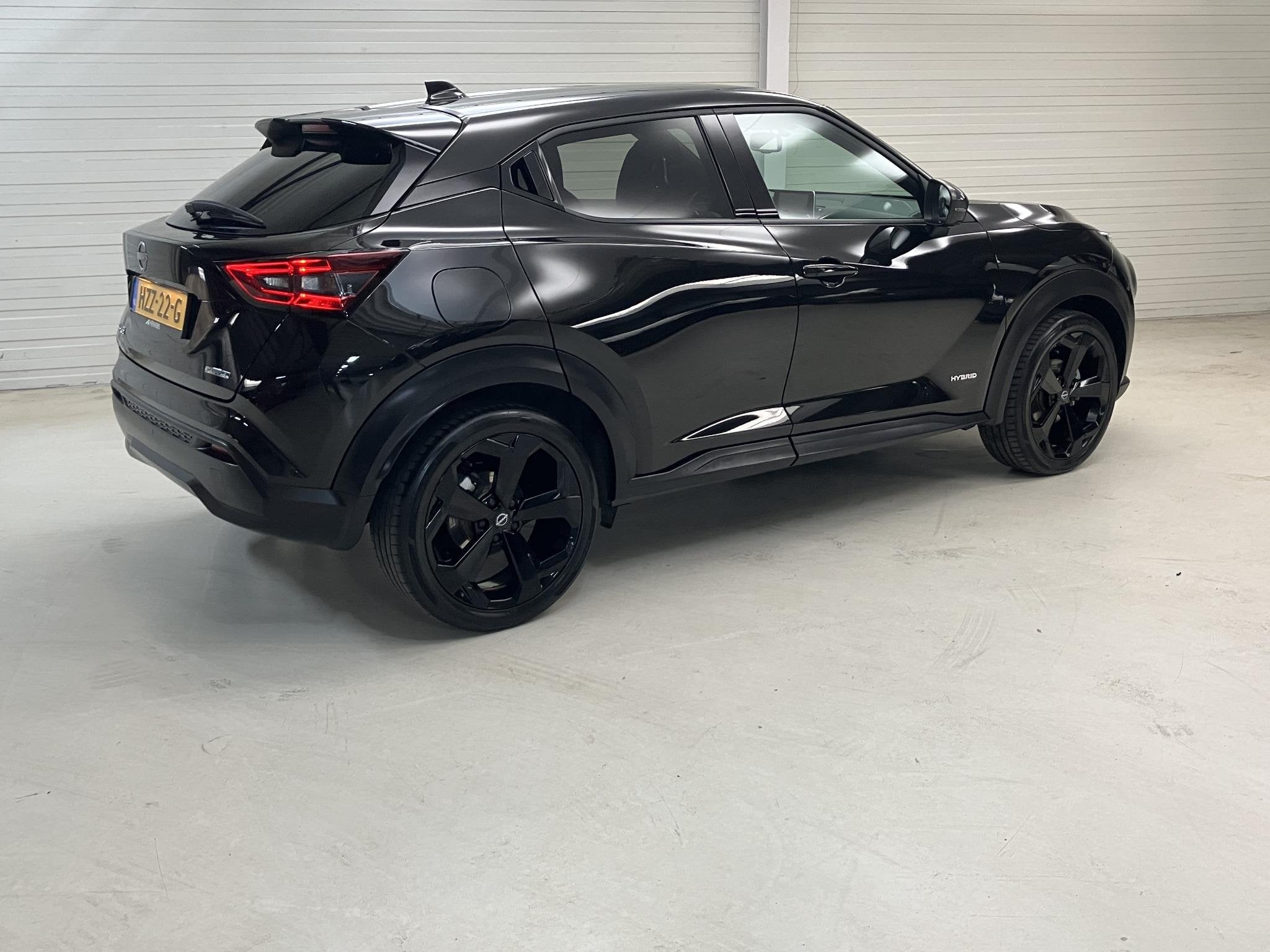 Nissan Juke 1.6 Hybrid Tekna / Dealer Onderhouden / Apple Ca, Auto's, 1300 kg, Gebruikt, Leder en Stof, Zwart