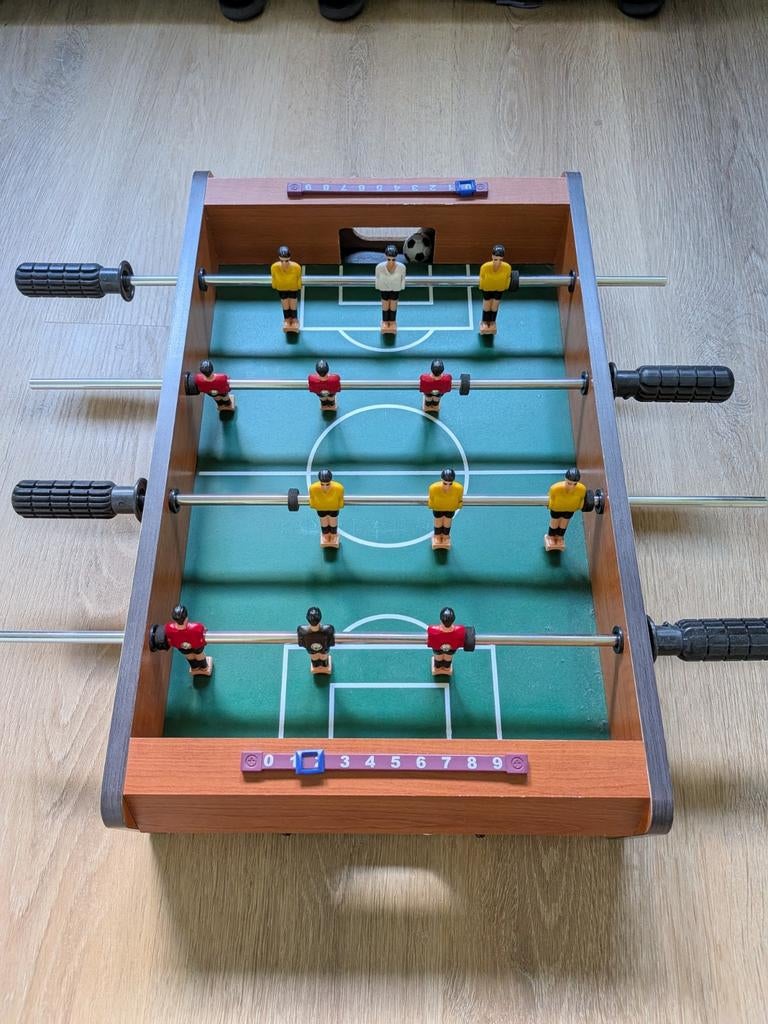 Mini tafelvoetbalspel, Ophalen