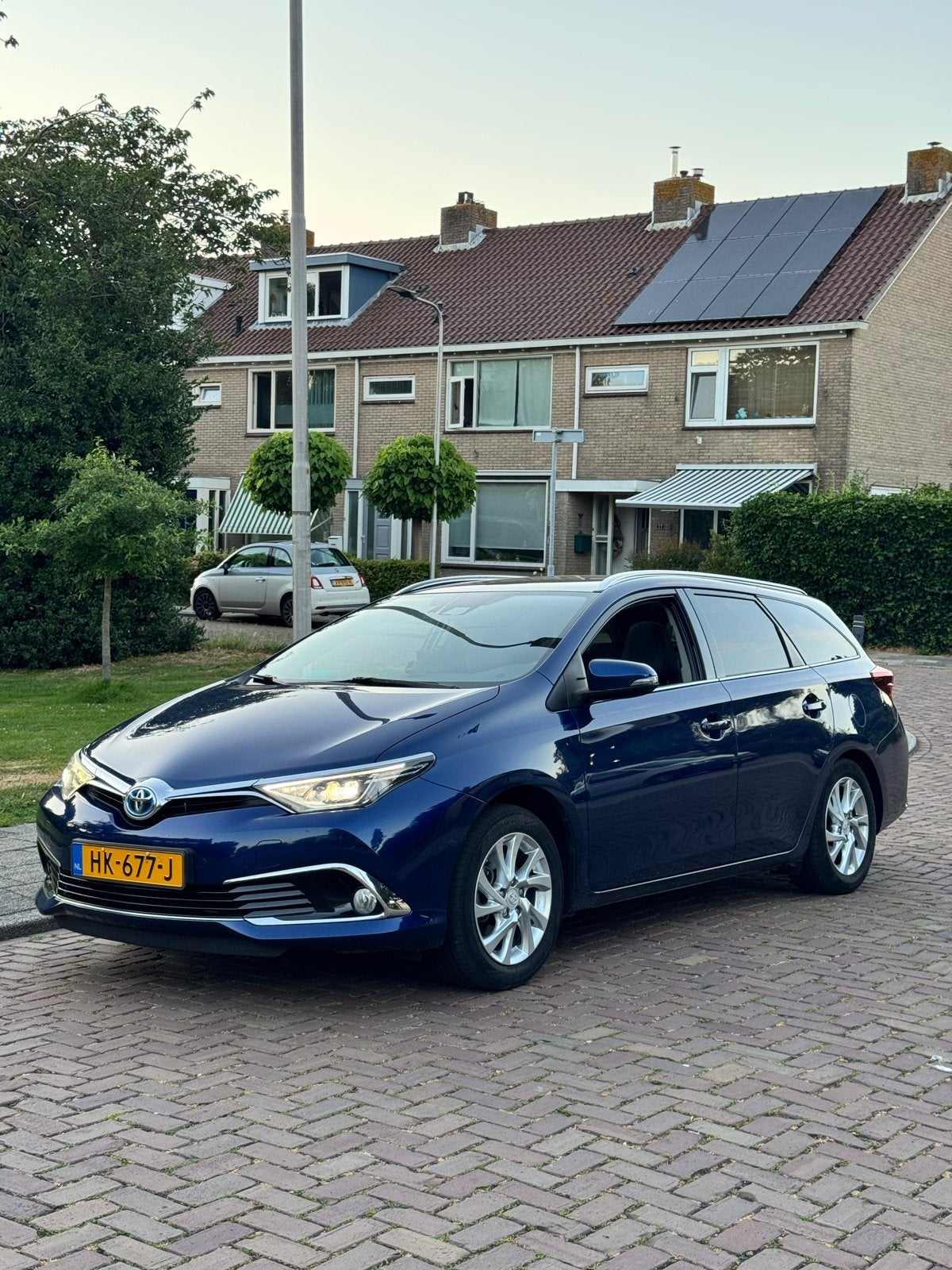 Toyota Auris 1.8 Hybrid Full Optie Panaroma, 28 km/l, Blauw, Leder en Stof, Parkeerassistent
