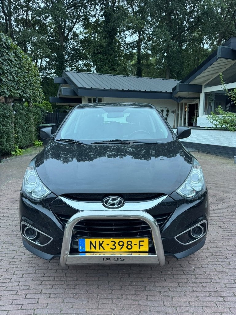 Hyundai iX35 1.6i GDI Blue 135pk 2013 Zwart, Auto's, Voorwielaandrijving, Stof, 1280 kg, 4 cilinders