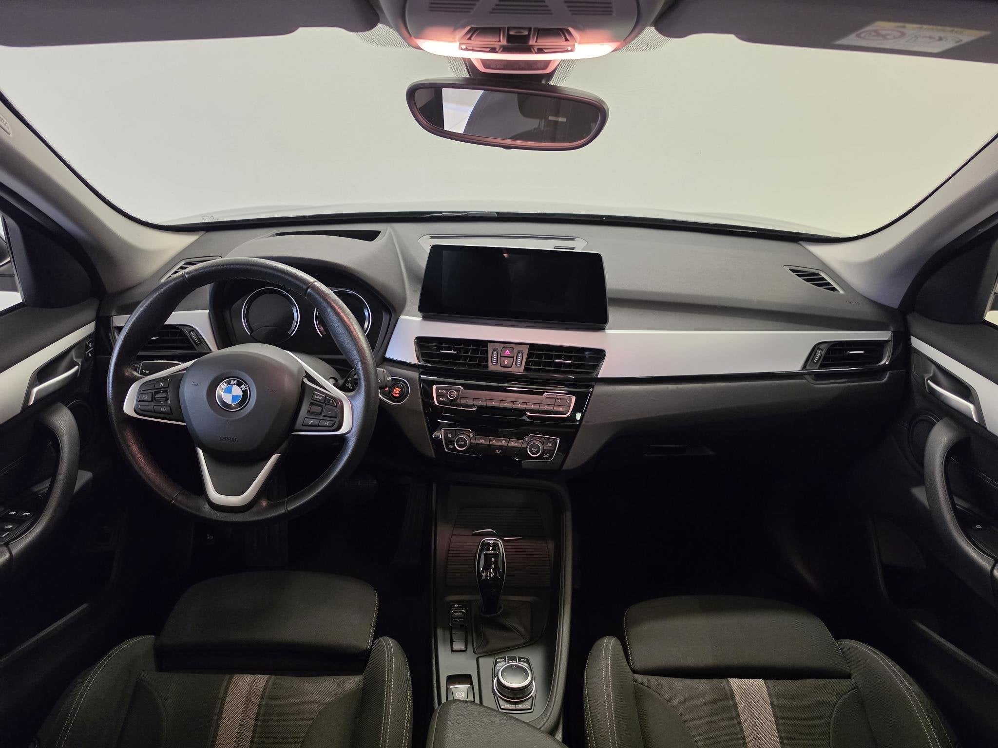 BMW X1 sDrive18i Executive Edition Camera | Panoramadak | Tr, Auto's, Gebruikt, Met garantie (alle), Zwart, Origineel Nederlands