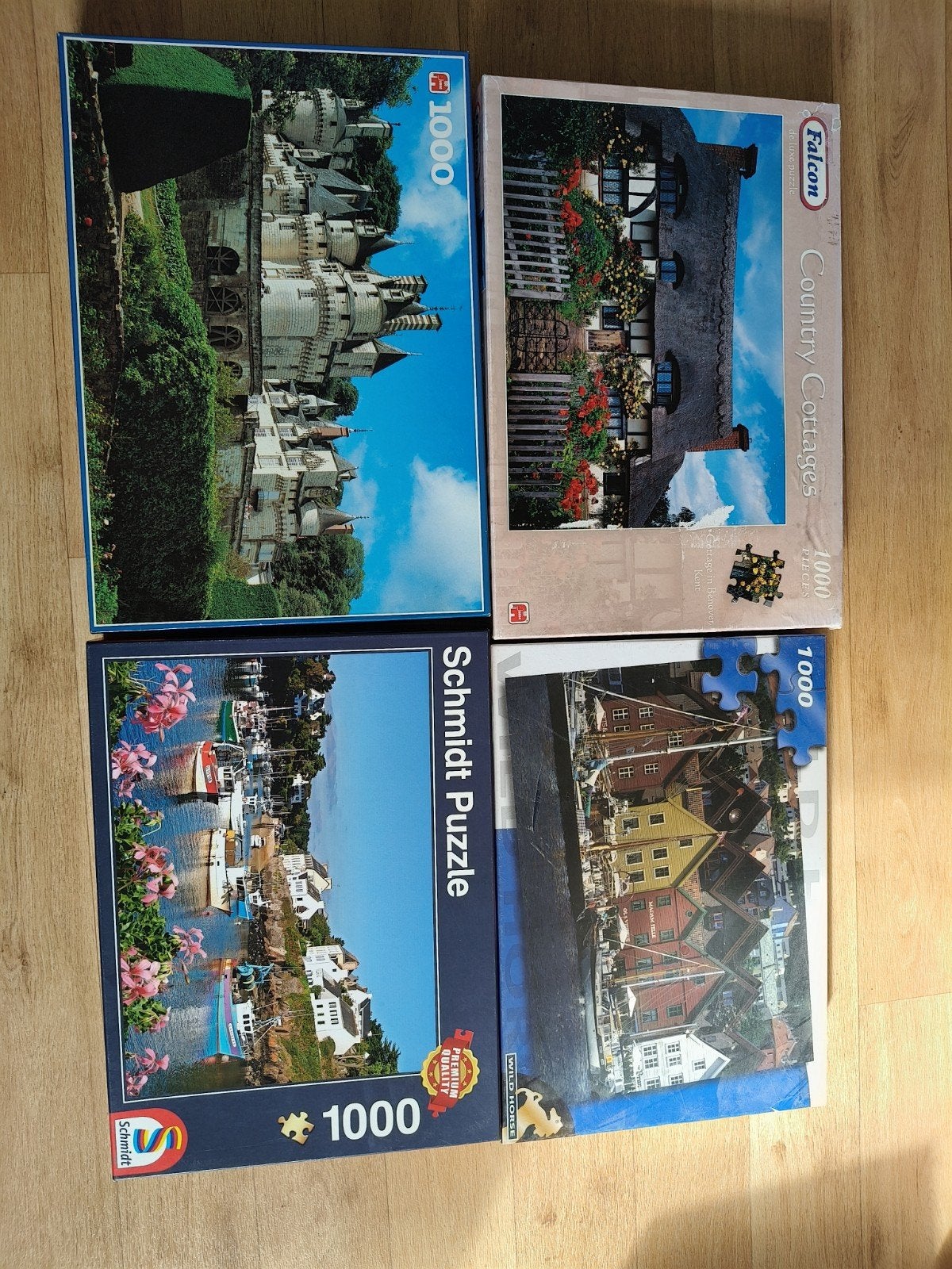 4x 1000 stukjes puzzels, Ophalen of Verzenden, 500 t/m 1500 stukjes, Gebruikt