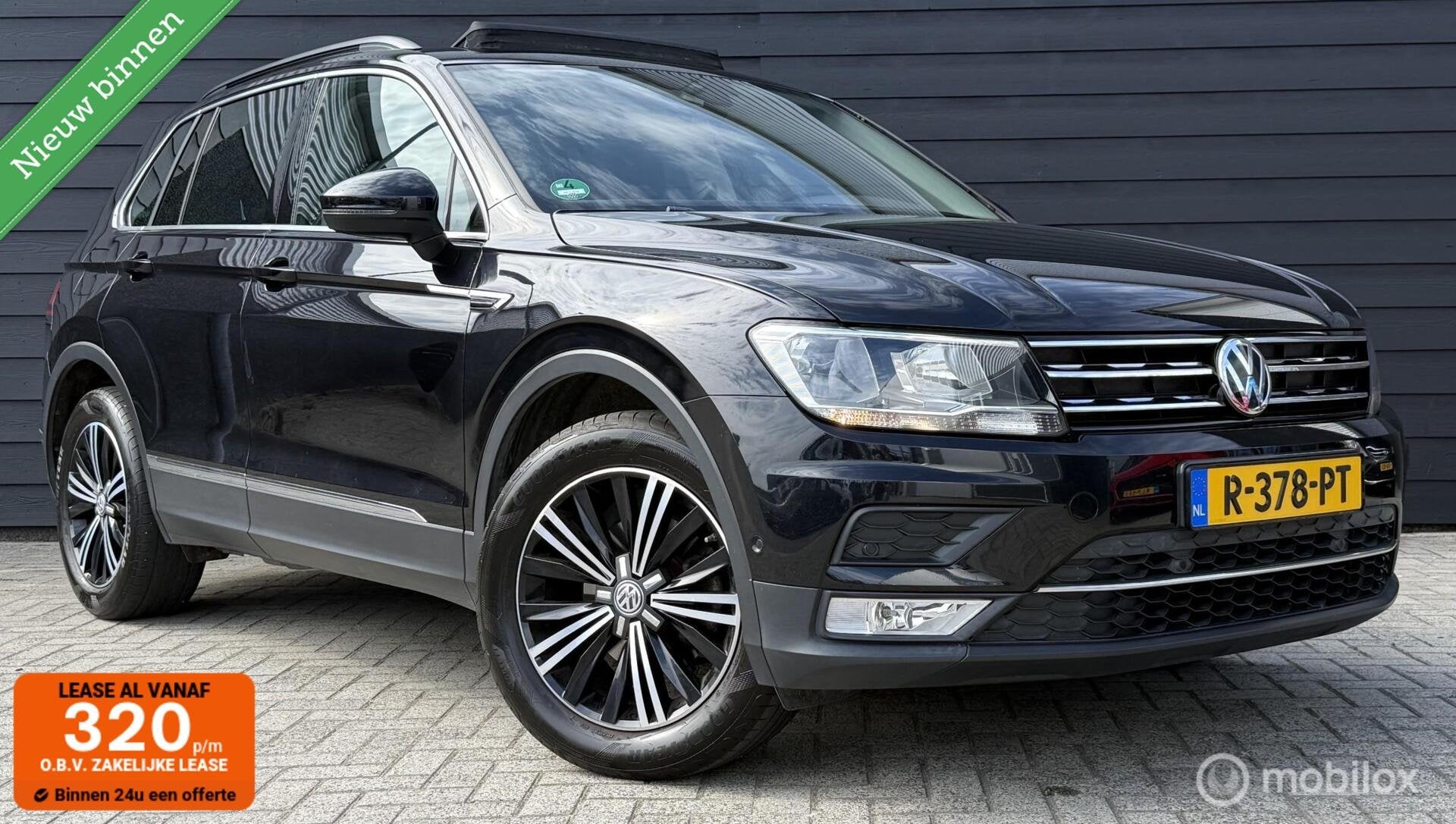 Volkswagen Tiguan 1.4 TSI ACT Comfortline + Pano.dak/Camera/, Auto's, Volkswagen, Euro 6, 4 cilinders, Zwart, Automatische klimaatregeling